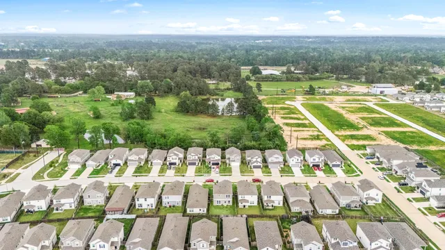 a view of swimming pool with a balcony