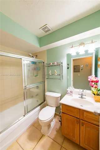 a work room with furniture and a window