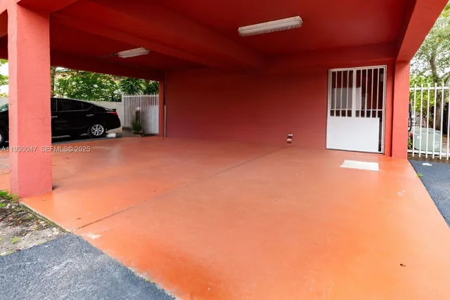 a view of a car in front of house
