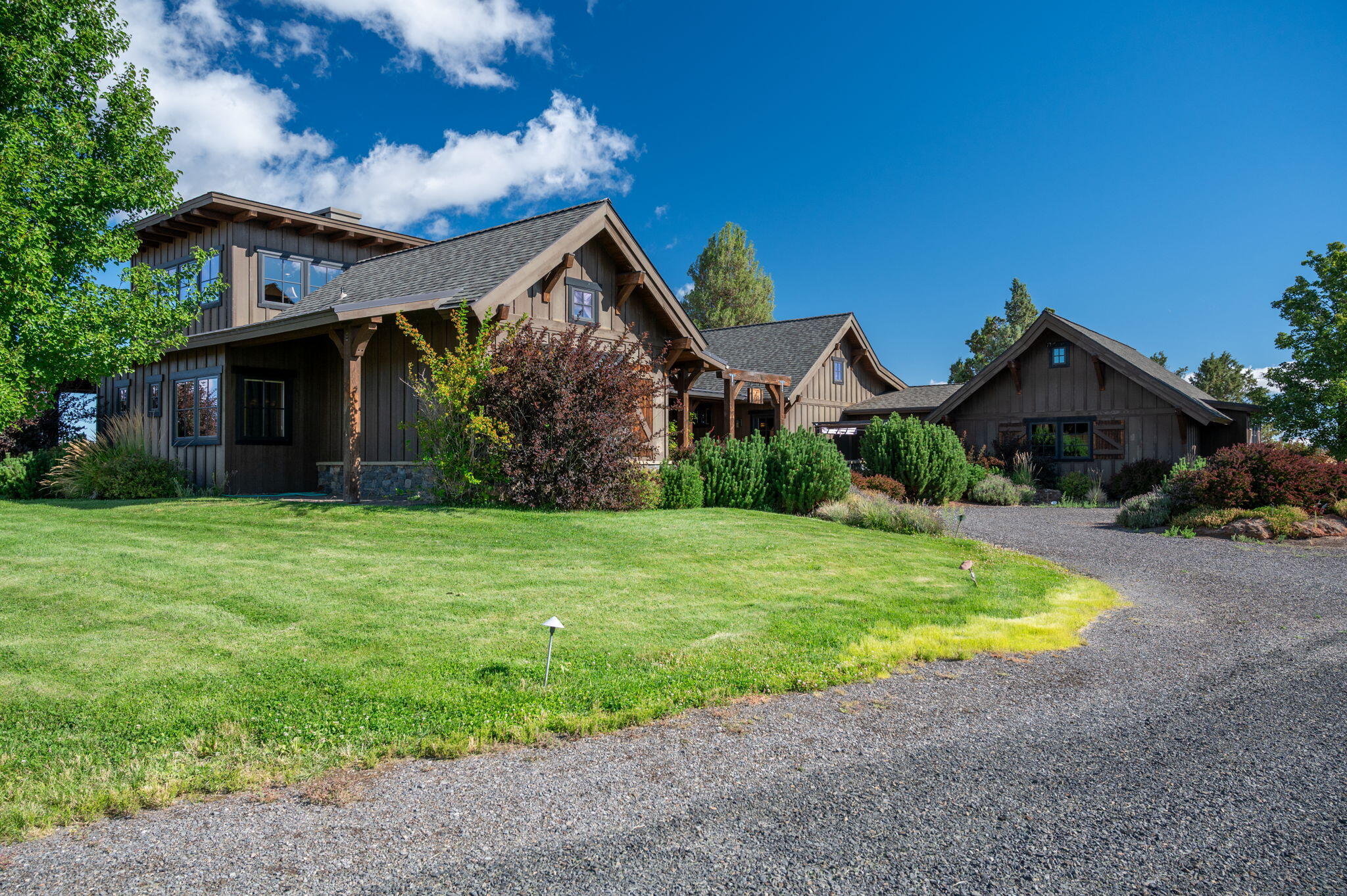 71285 Holmes Road Sisters, OR 97759 - Photo 102 of 123 a view of a big house with a big yard and potted plants
