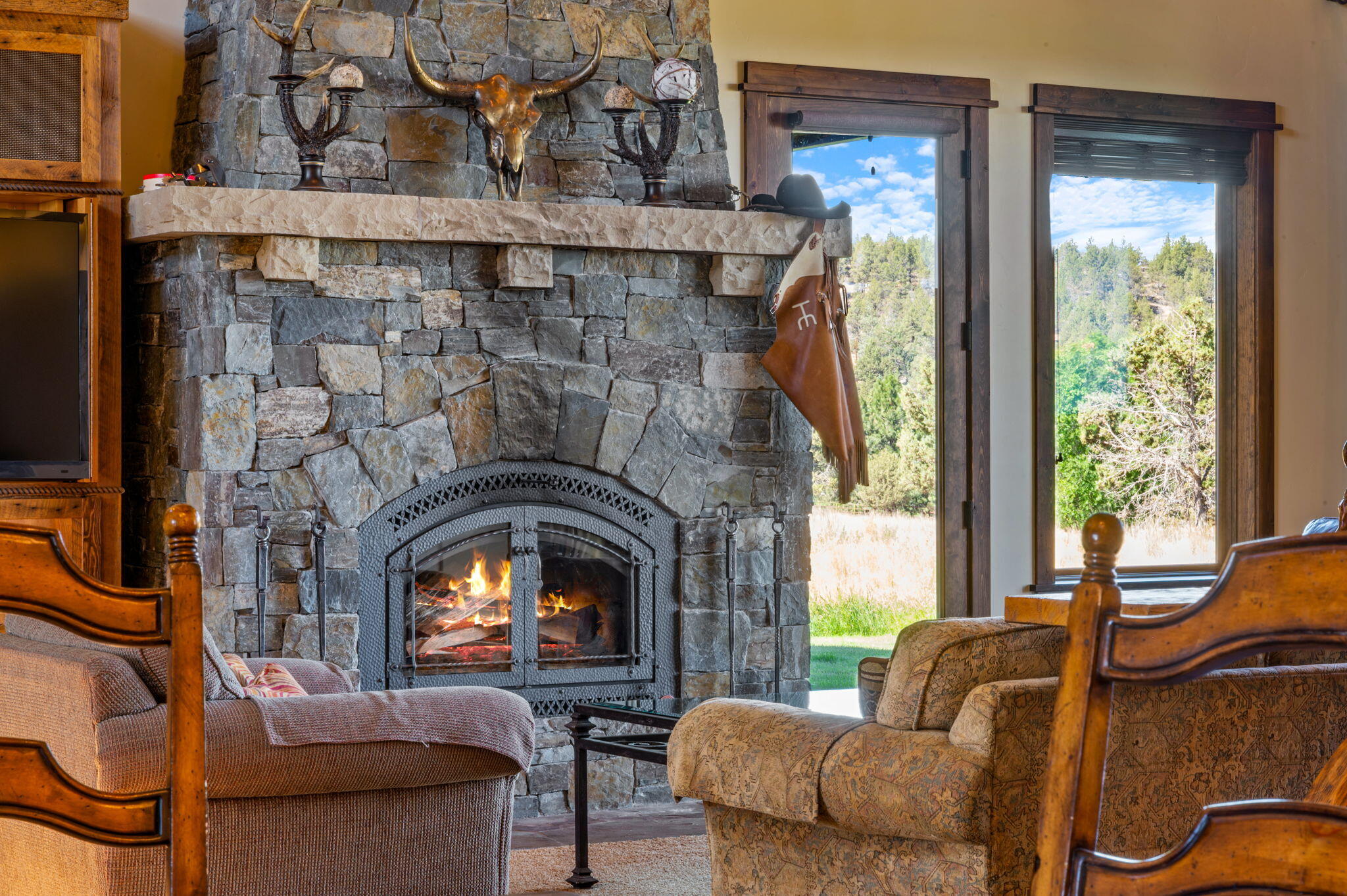 71285 Holmes Road Sisters, OR 97759 - Photo 117 of 123 a living room with furniture and a fireplace