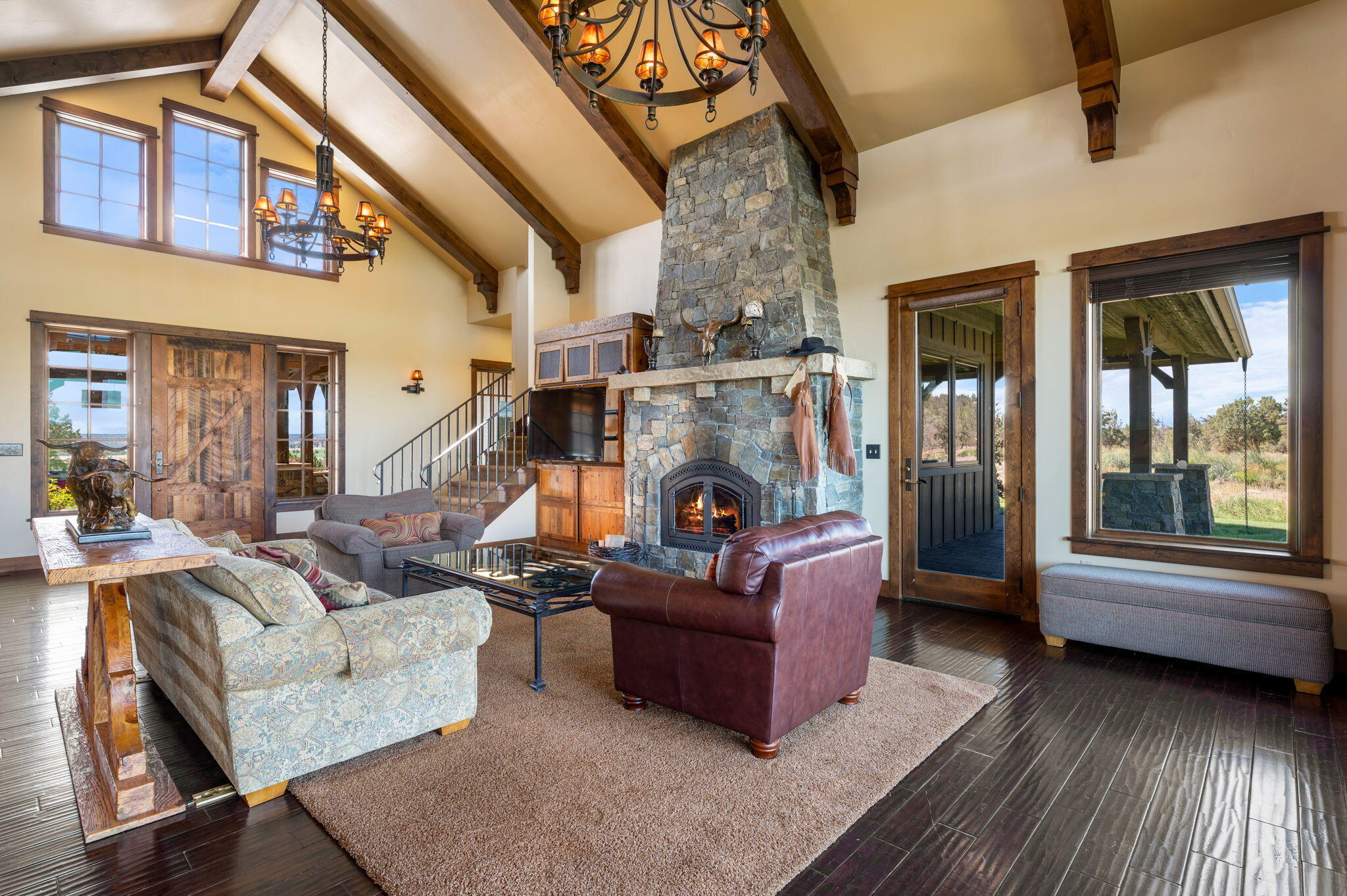 71285 Holmes Road Sisters, OR 97759 - Photo 120 of 123 a living room with fireplace furniture and a large window