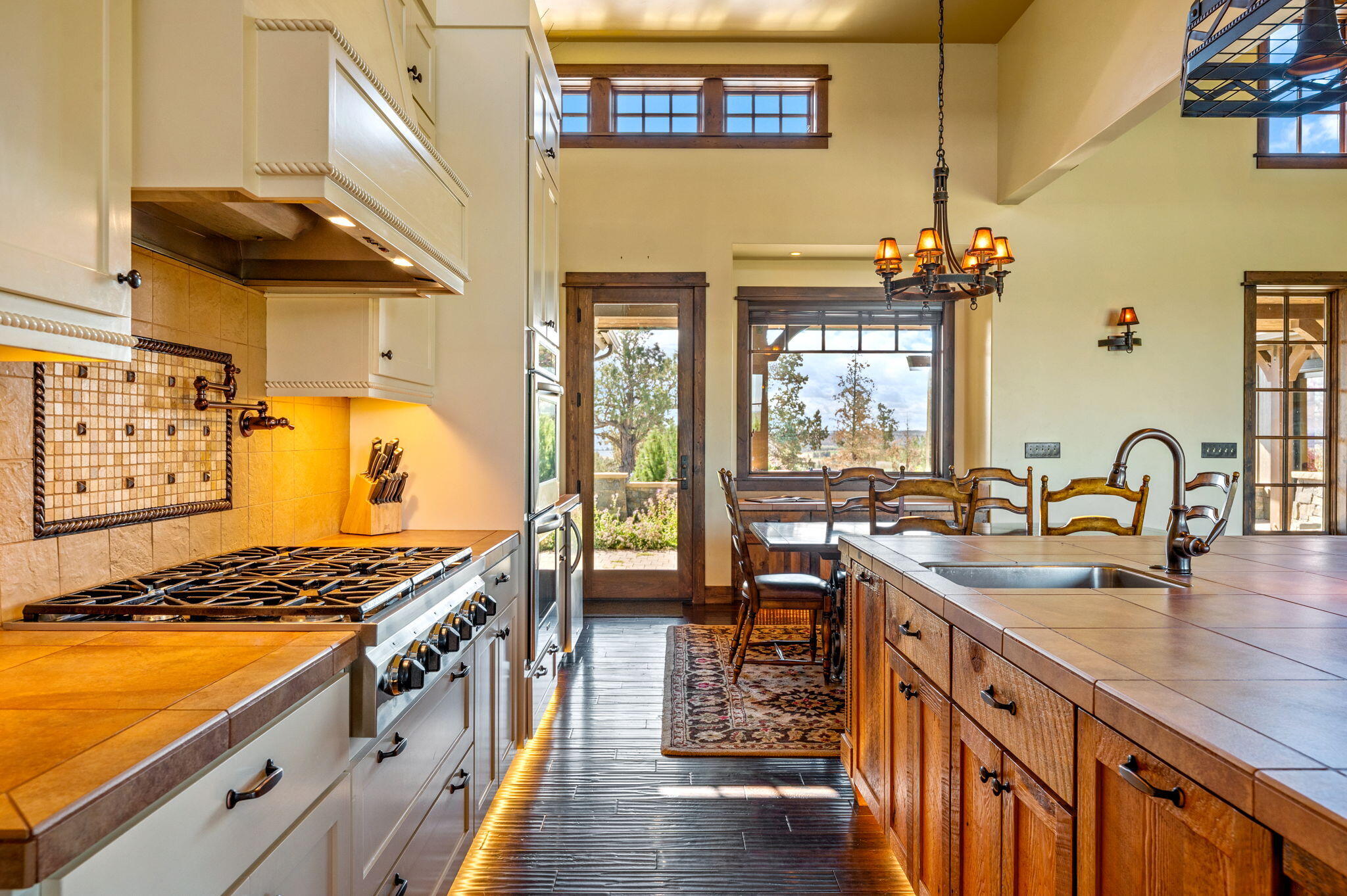 71285 Holmes Road Sisters, OR 97759 - Photo 15 of 123 a kitchen with sink stove and cabinets