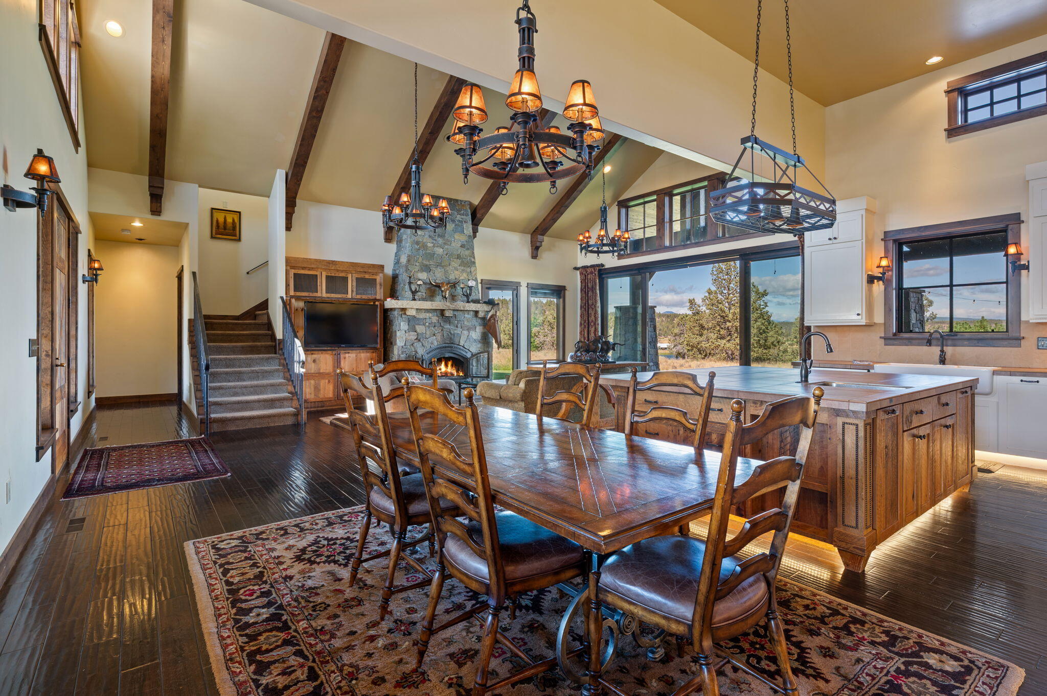 71285 Holmes Road Sisters, OR 97759 - Photo 27 of 123 a view of a dining room with furniture and wooden floor