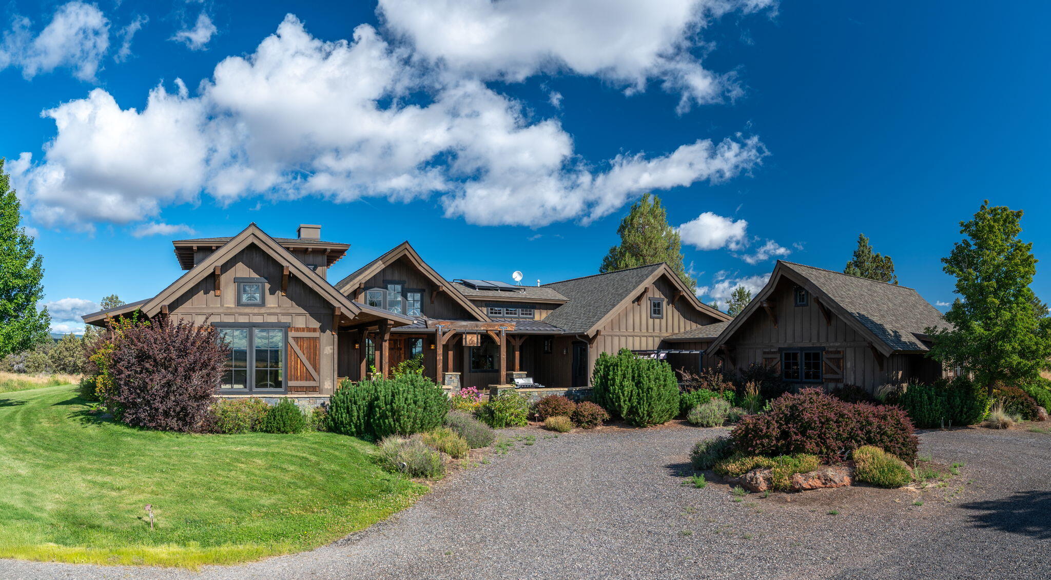 71285 Holmes Road Sisters, OR 97759 - Photo 3 of 123 a front view of a house with a garden