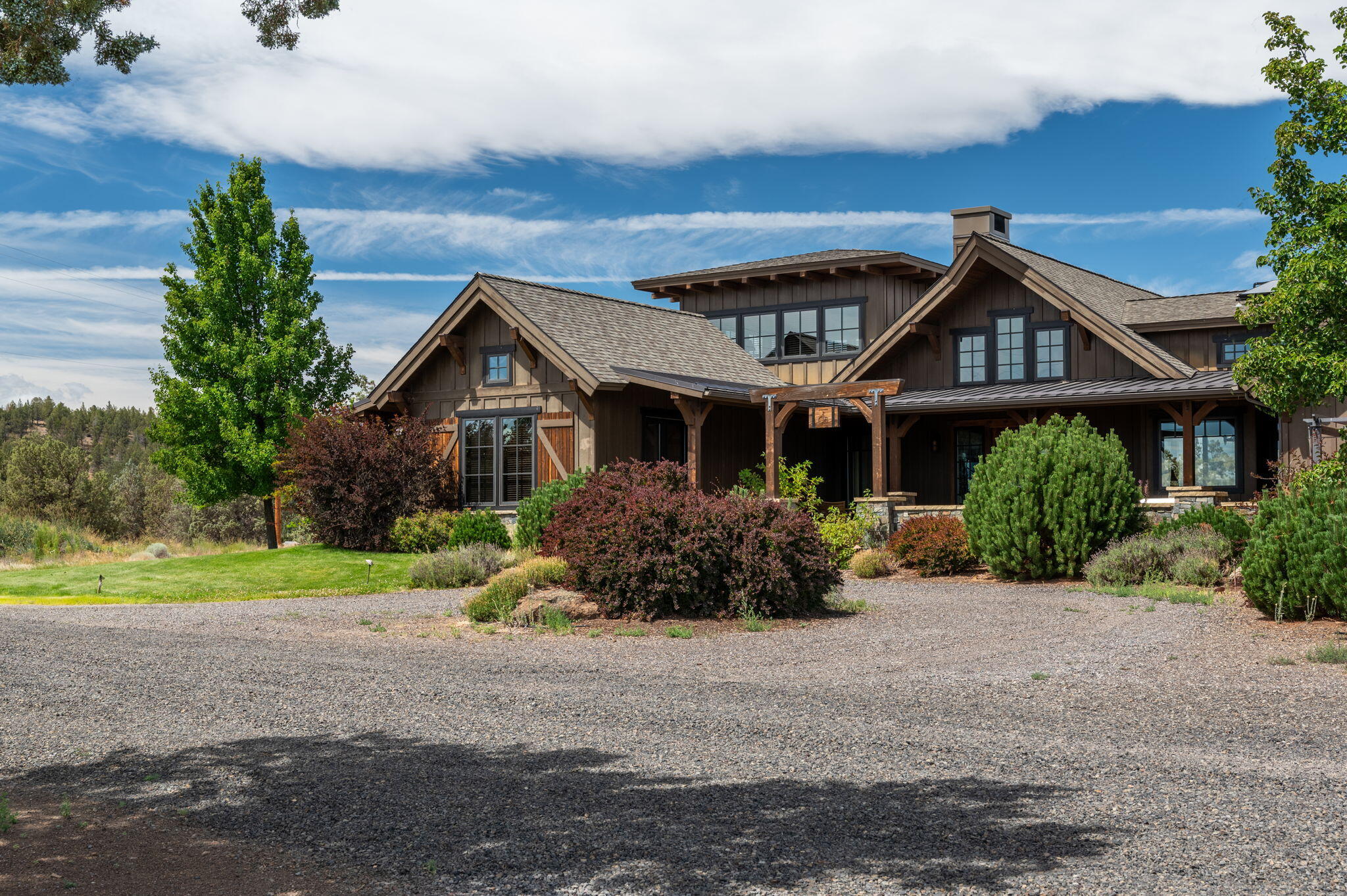 71285 Holmes Road Sisters, OR 97759 - Photo 97 of 123 a front view of a house with a yard and garage