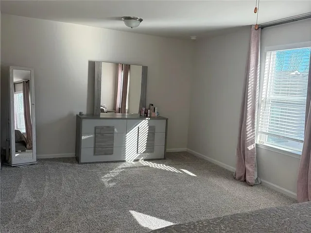 a bathroom with a sink a toilet and bathtub