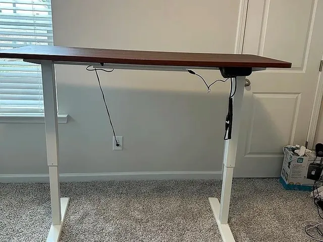 a bathroom with double sink and two mirror