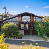 a view of a house with a swimming pool