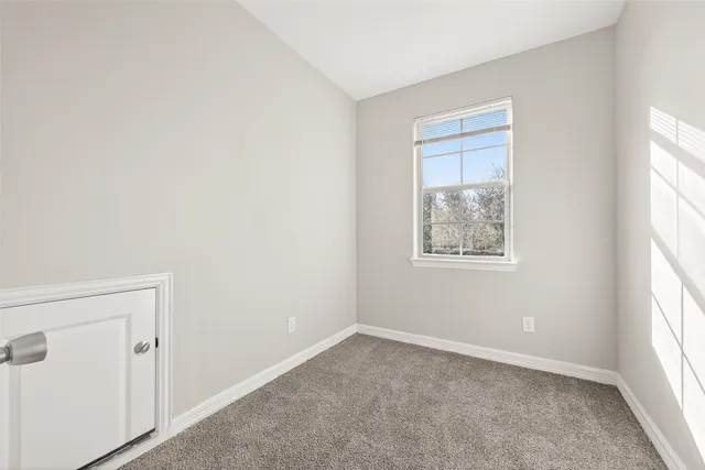 a front view of a house with a glass door