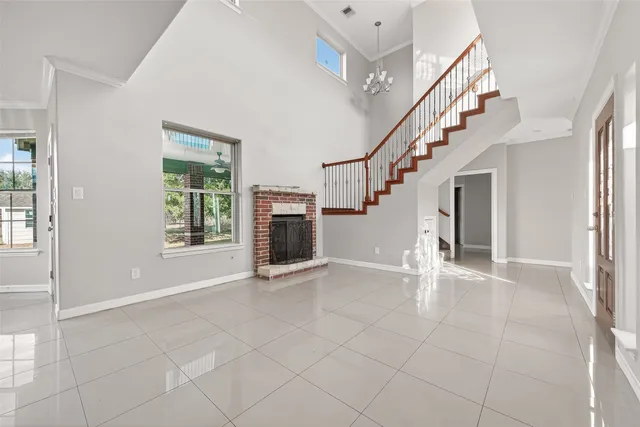 a view of entryway and hall with a front door