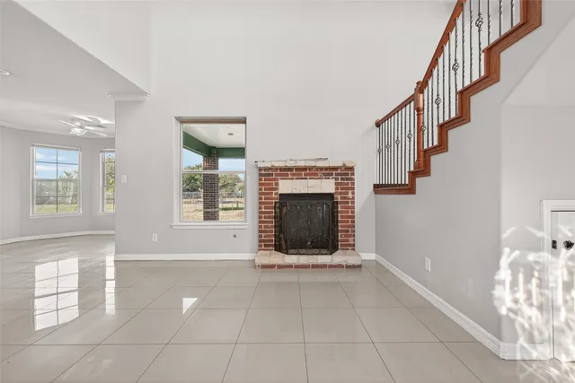 a view of entryway and hall with a window
