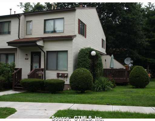 Exterior Front. beautiful end unit with two decks for entertaining.