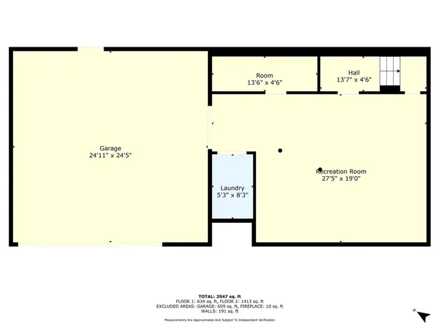 a view of a city with lush green forest