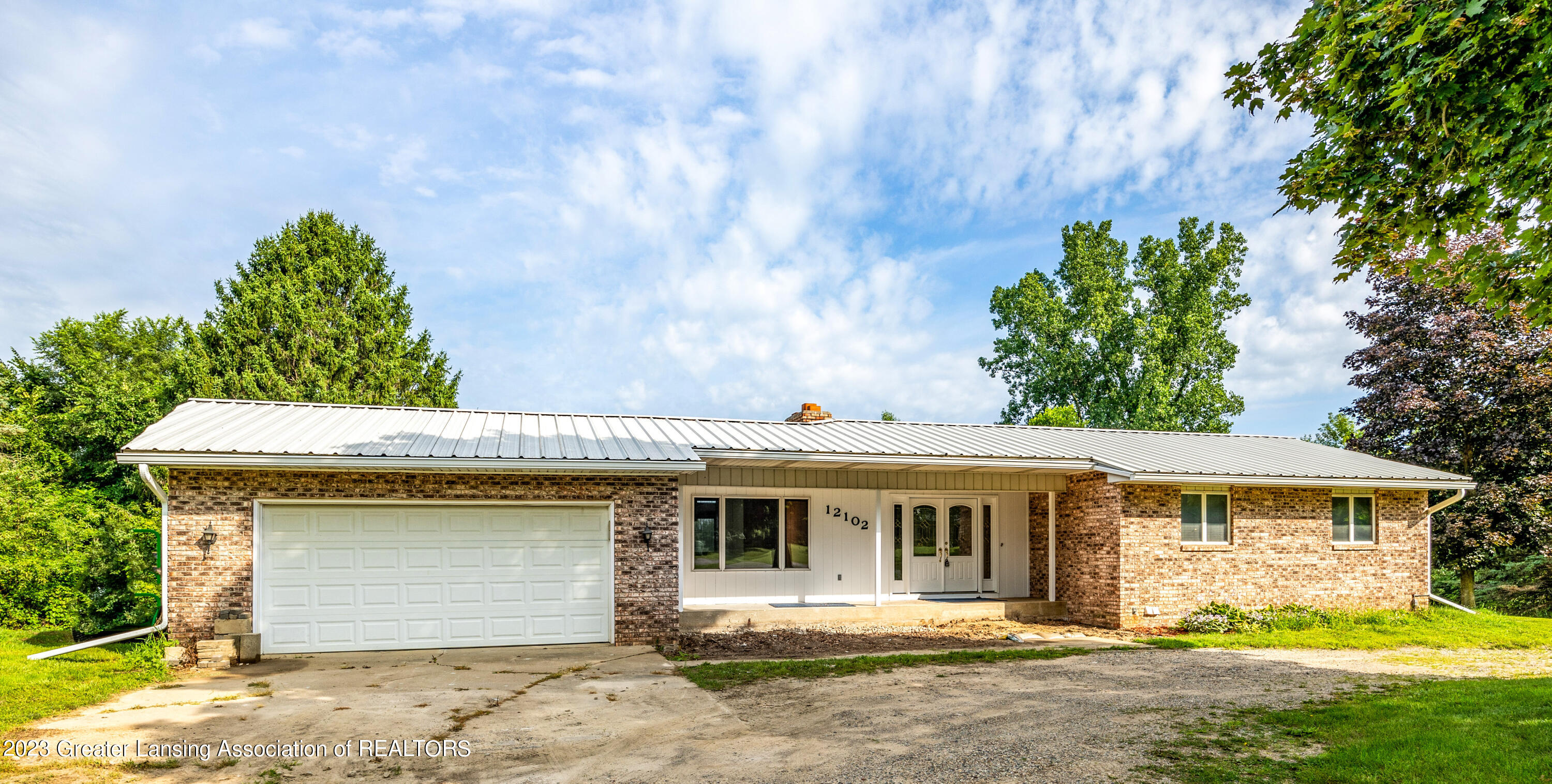 12102 Raelyn Hills Drive Perry, MI 48872 - Photo 1 of 28 Front