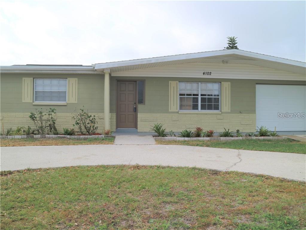4102 Darlington Road Holiday, FL 34691 - Photo 3 of 9 a front view of a house