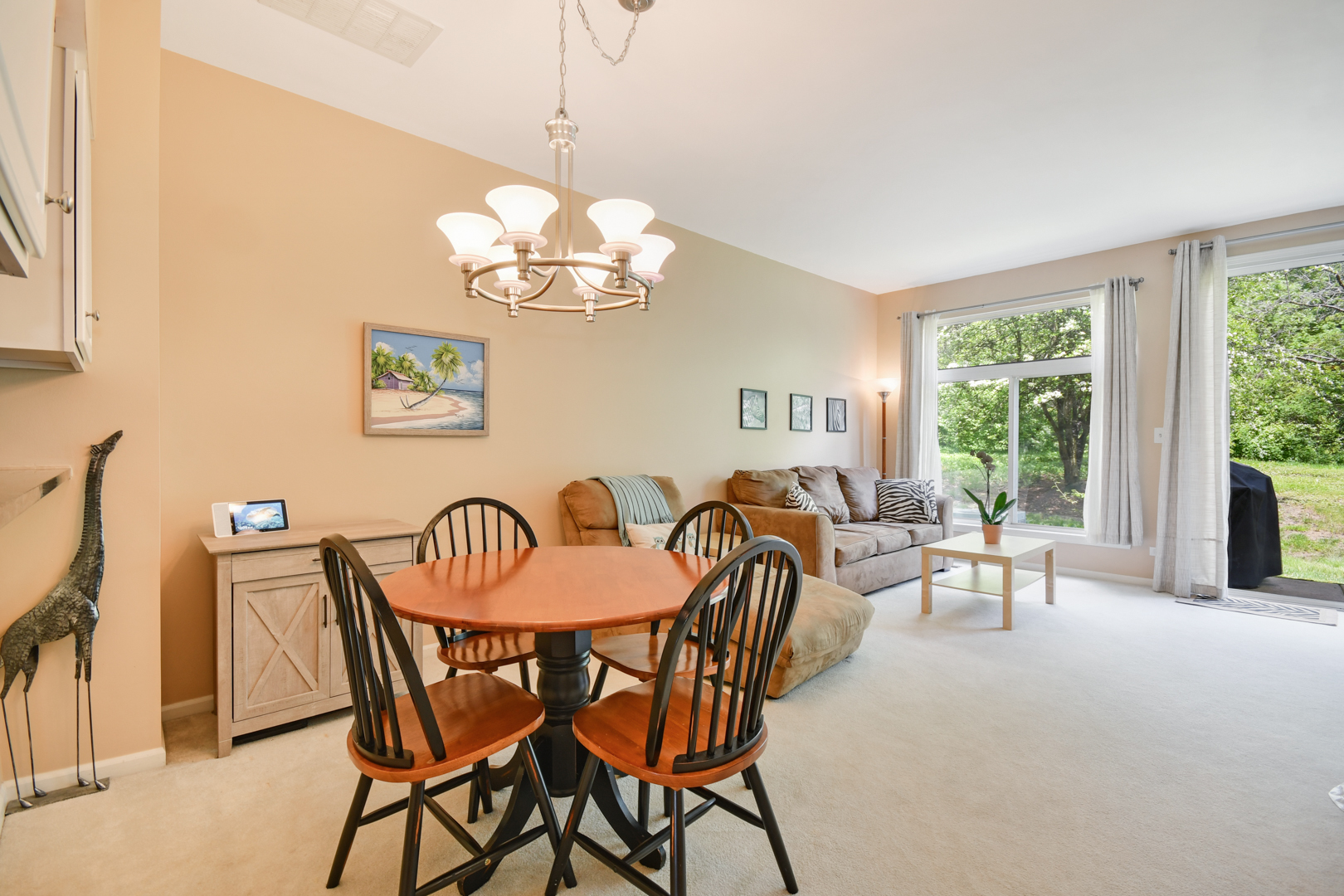 8211 Ripple Ridge Darien, IL 60561 - Photo 5 of 17 a view of a dining room with furniture window and outside view