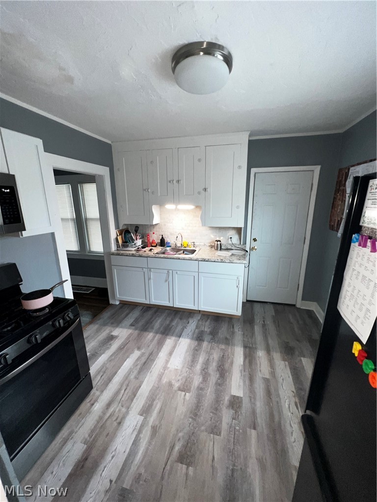 11107 Buckeye Road Cleveland, OH 44104 - Photo 4 of 14 Gallery Image 4