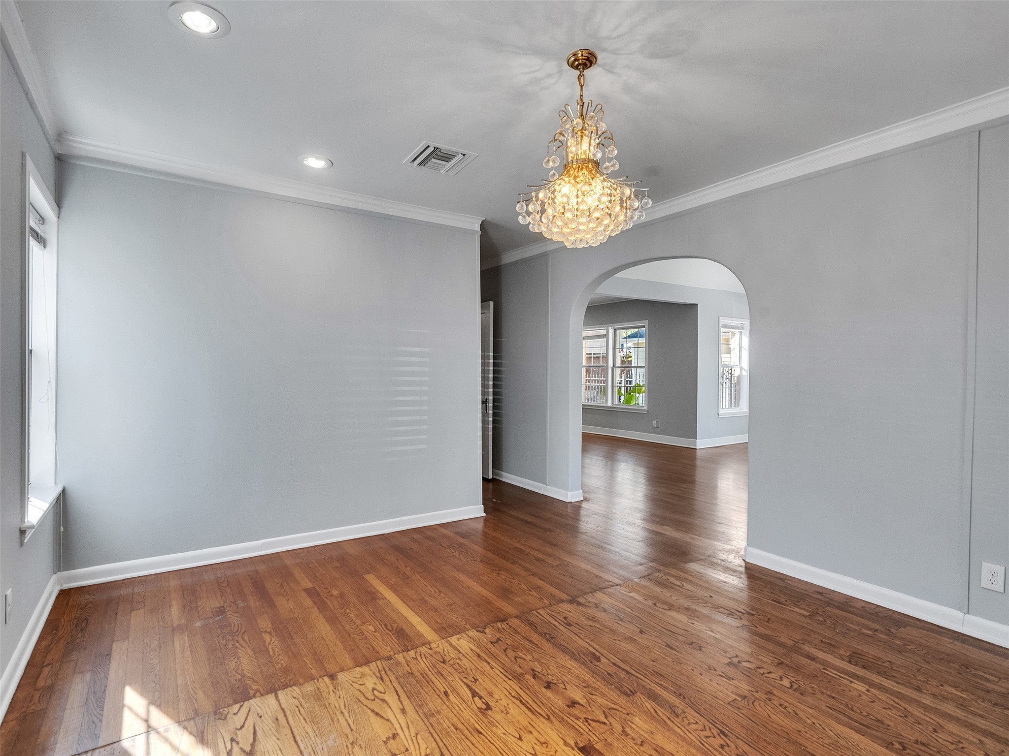 2141 Colquitt Street Houston, TX 77098 - Photo 13 of 50 wooden floor in an empty room with a window
