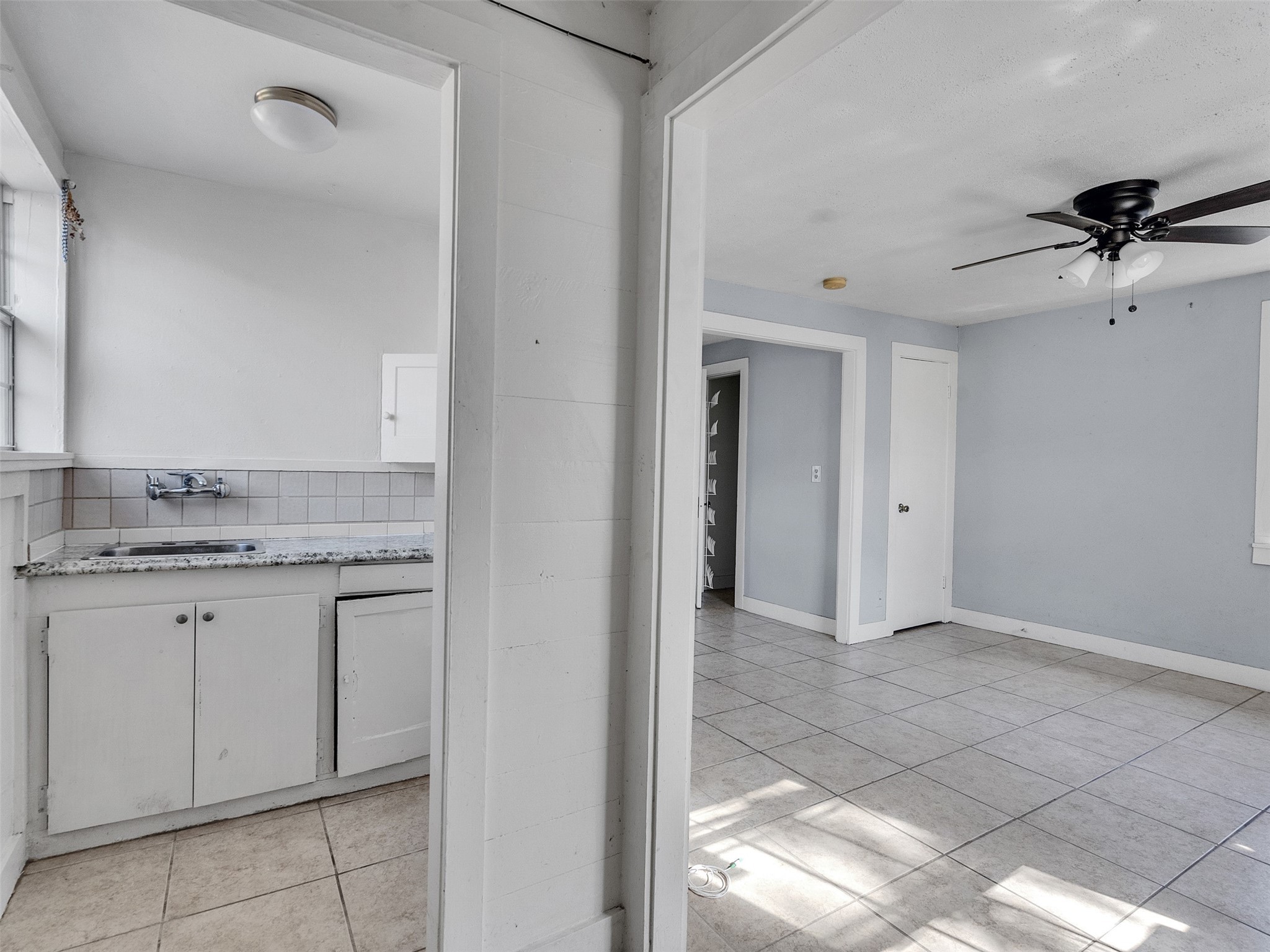 2141 Colquitt Street Houston, TX 77098 - Photo 31 of 50 a view of a kitchen with a sink and cabinets