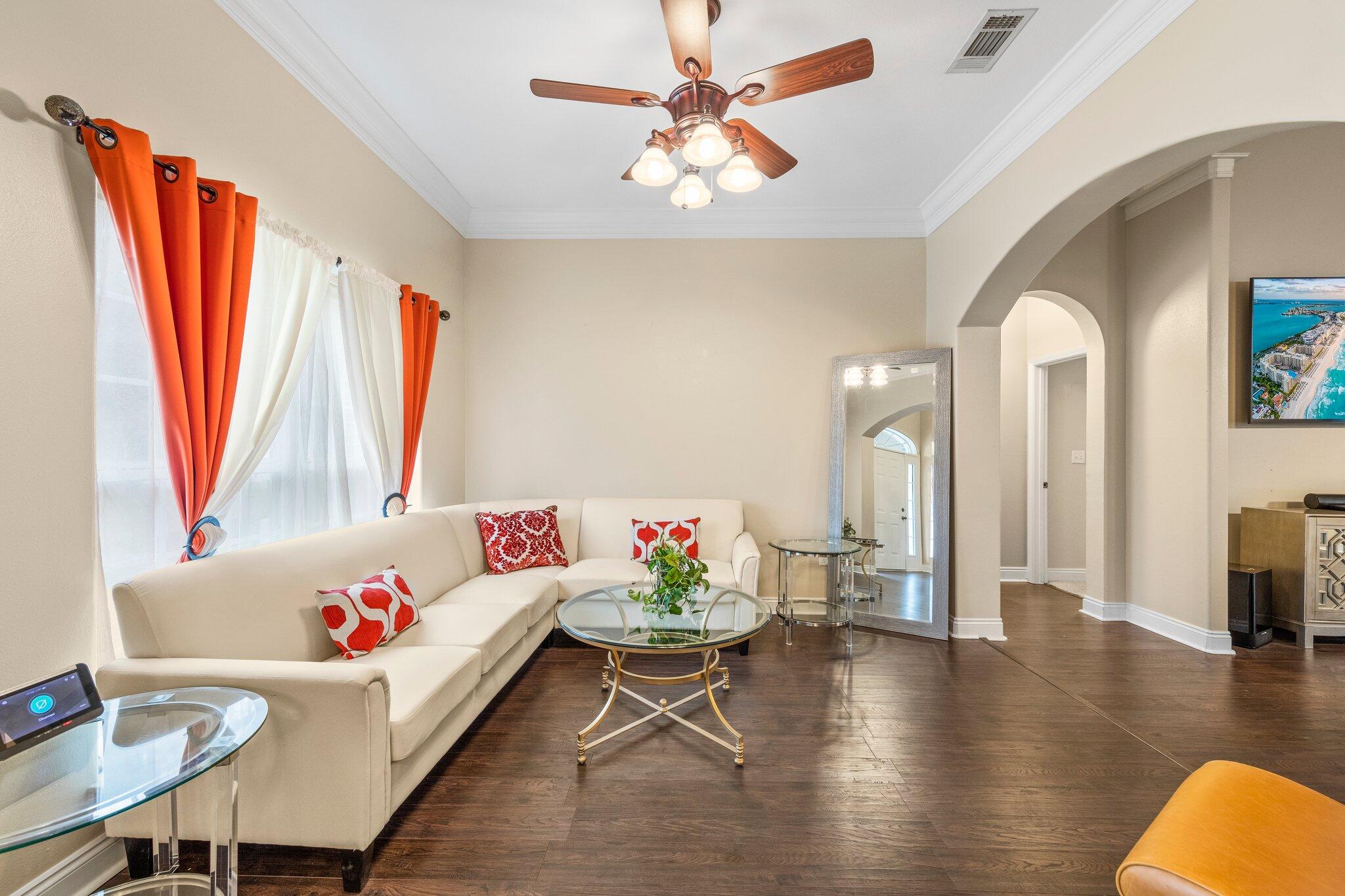 901 Shoal River Drive Crestview, FL 32539 - Photo 19 of 56 a living room with furniture and a large window