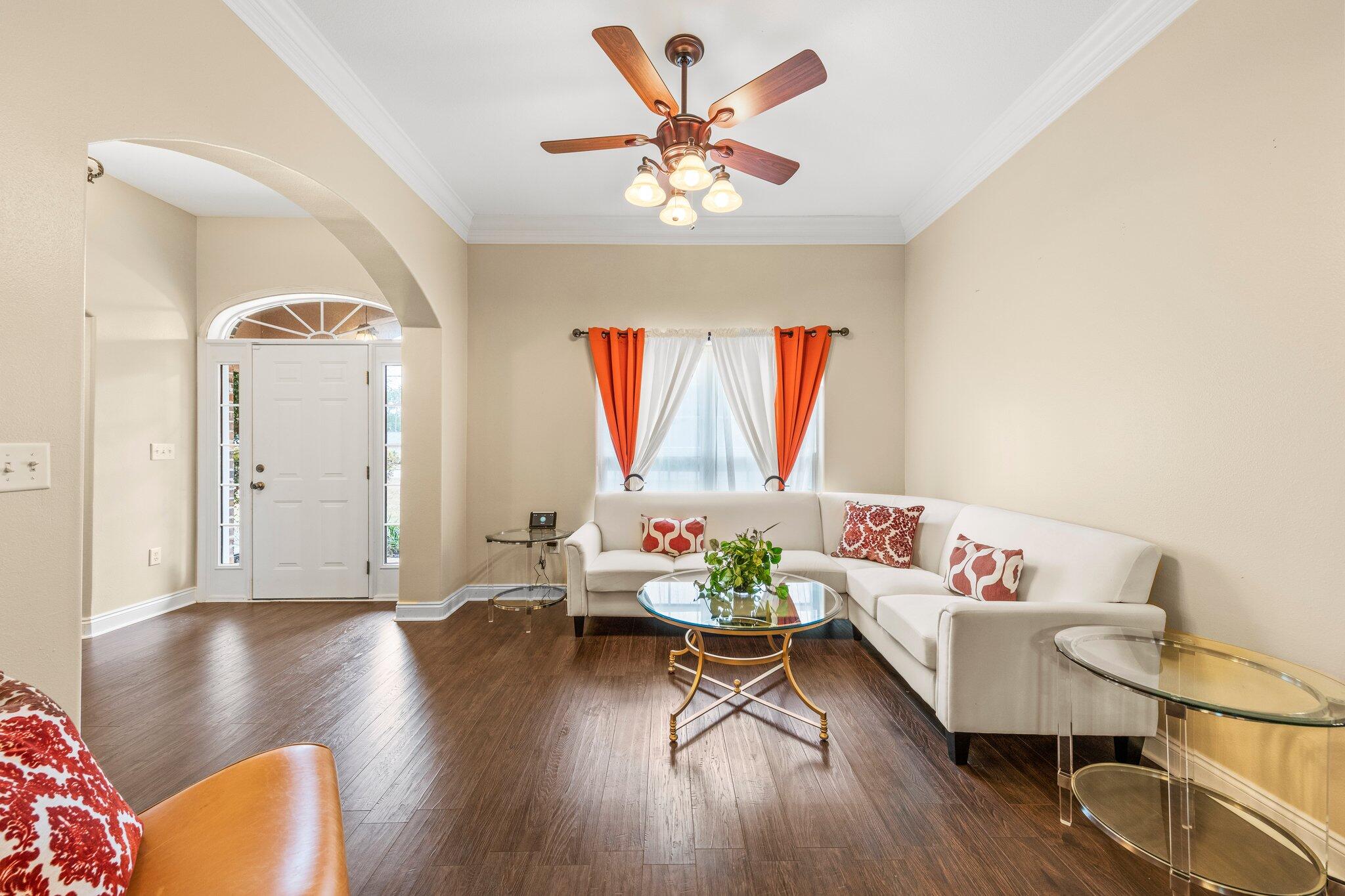 901 Shoal River Drive Crestview, FL 32539 - Photo 20 of 56 a living room with furniture and wooden floor