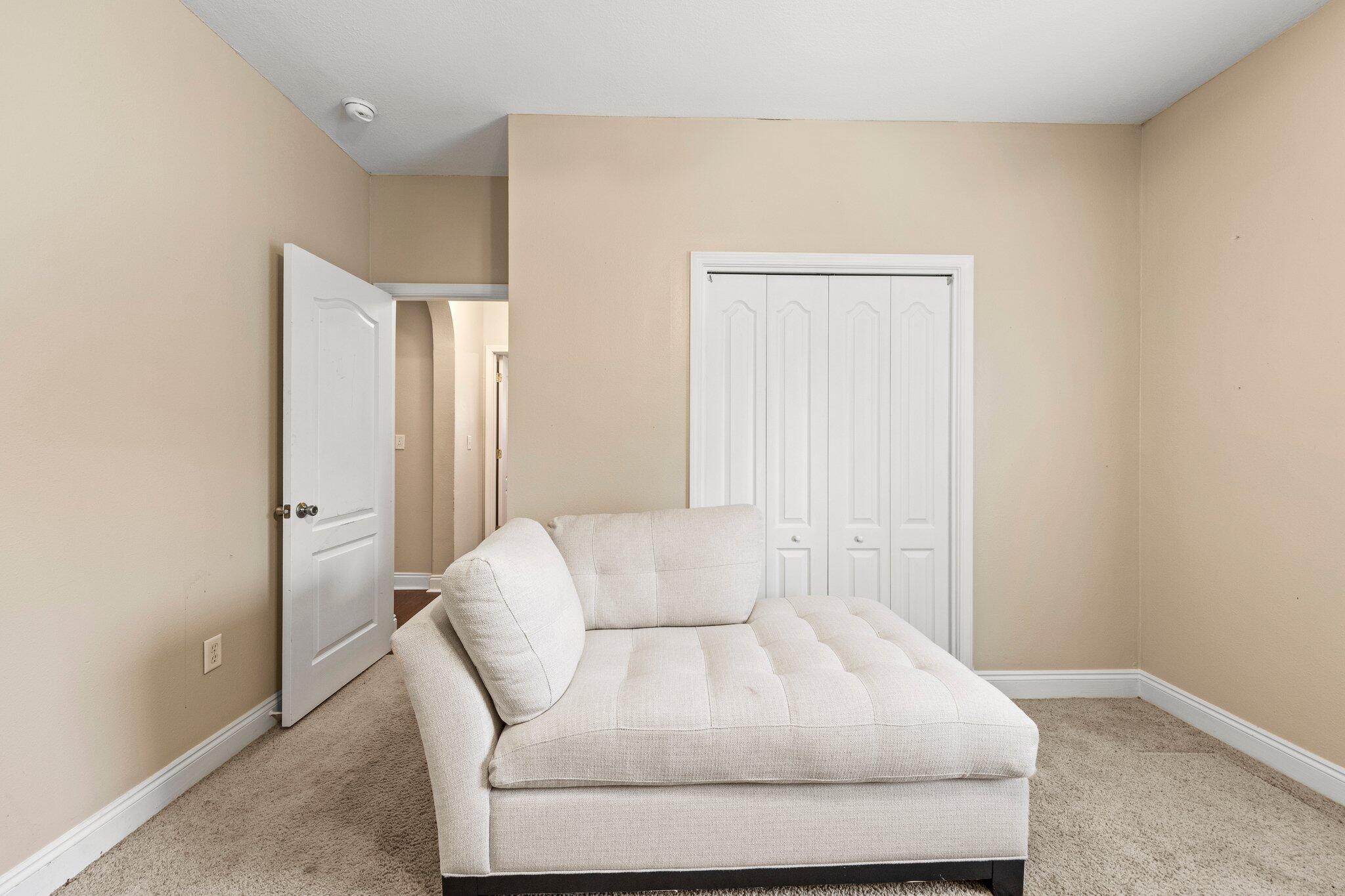 901 Shoal River Drive Crestview, FL 32539 - Photo 22 of 56 a living room with furniture and a window