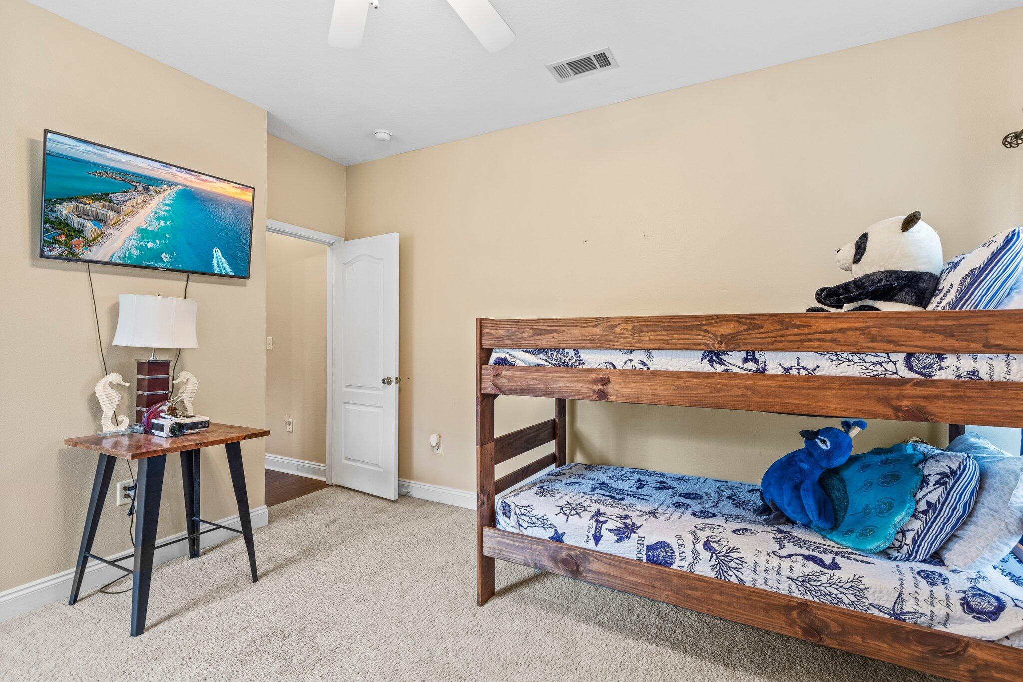 901 Shoal River Drive Crestview, FL 32539 - Photo 31 of 56 a bed room with a bed and a lamp