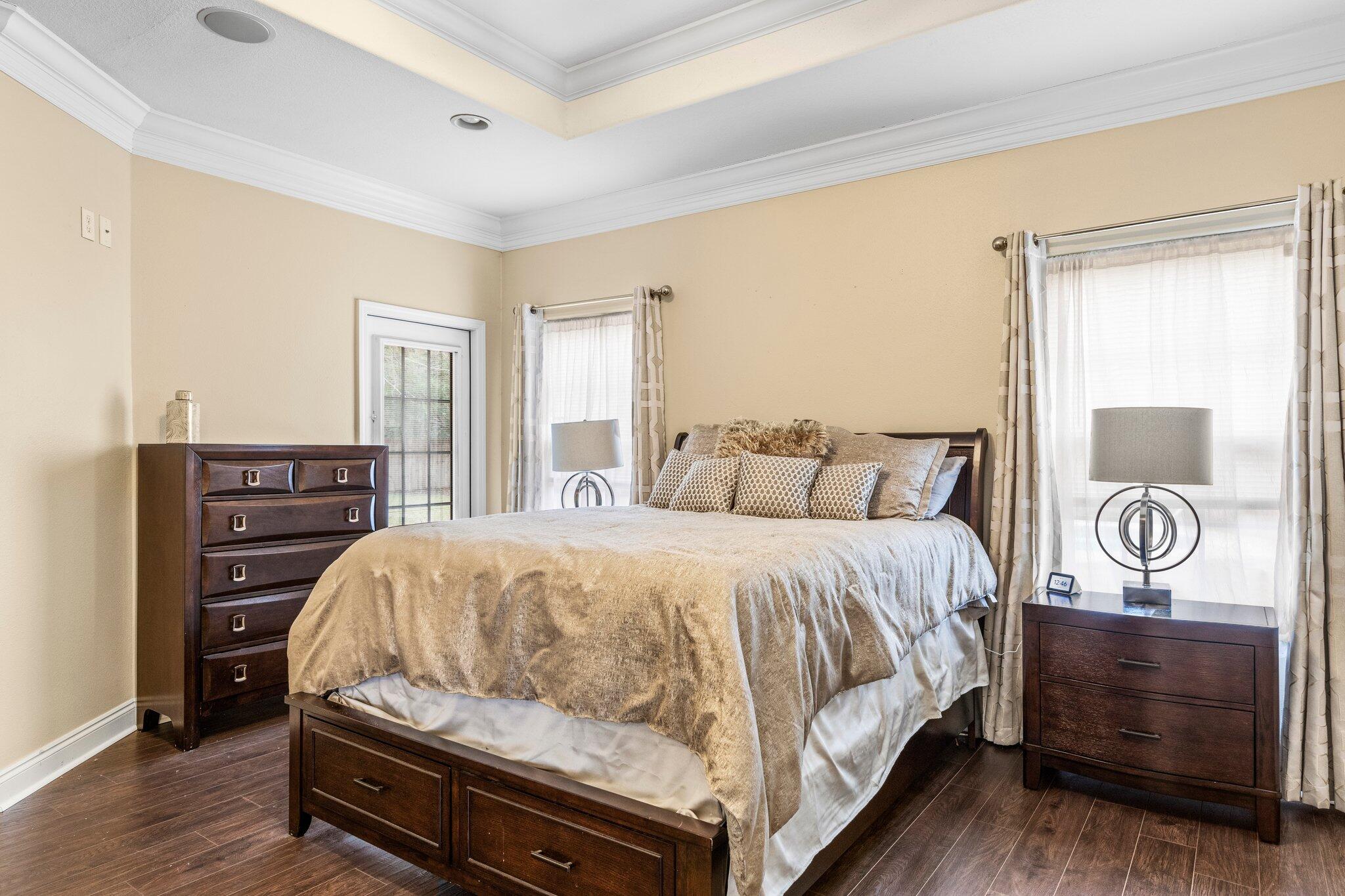 901 Shoal River Drive Crestview, FL 32539 - Photo 35 of 56 a bedroom with a bed and dresser