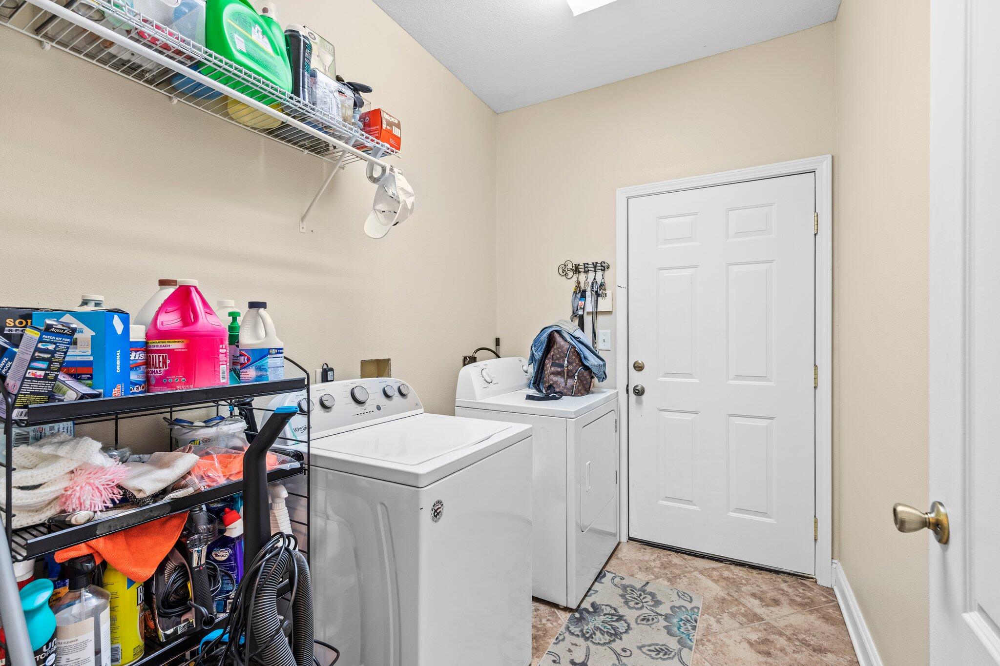 901 Shoal River Drive Crestview, FL 32539 - Photo 41 of 56 a utility room with dryer and washer