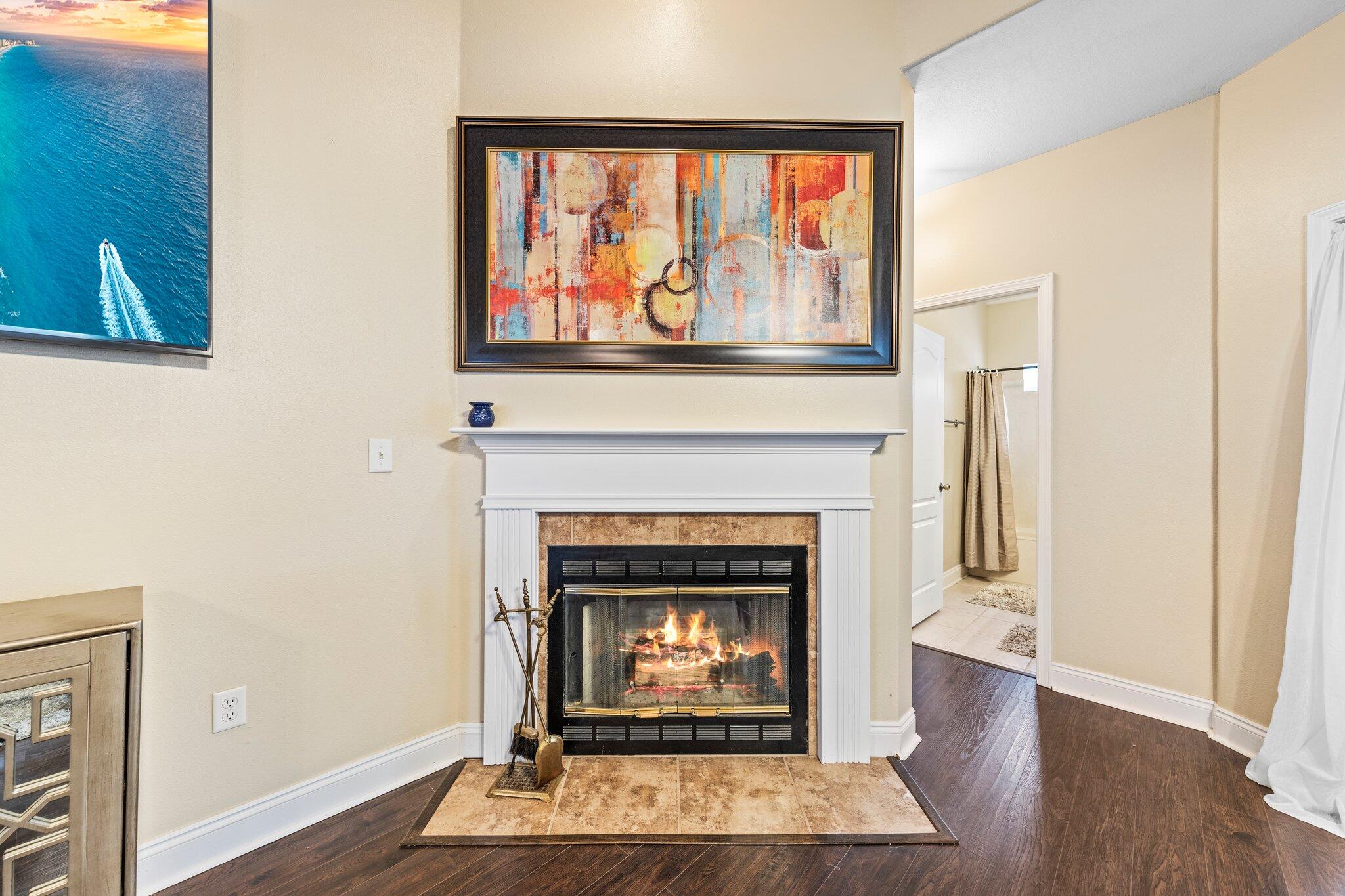 901 Shoal River Drive Crestview, FL 32539 - Photo 53 of 56 a living room with furniture a fireplace and wooden floor