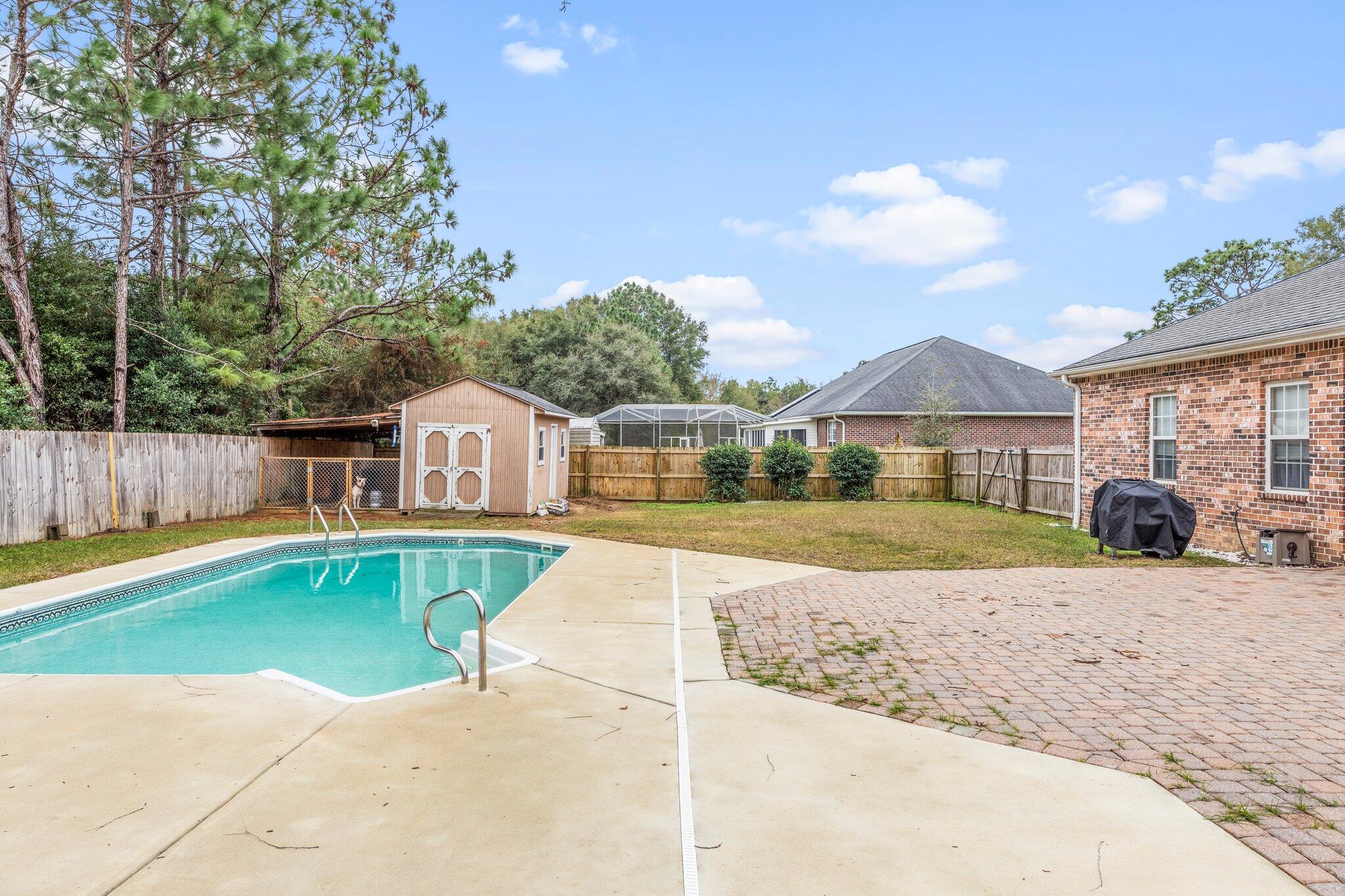 901 Shoal River Drive Crestview, FL 32539 - Photo 6 of 56 a view of a house with a yard