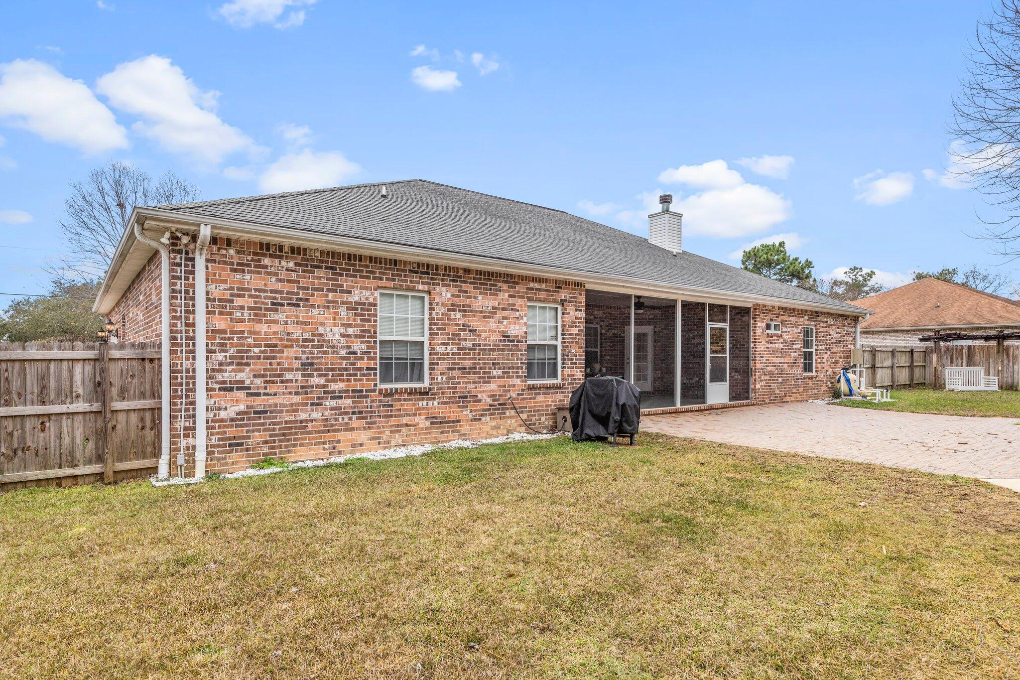 901 Shoal River Drive Crestview, FL 32539 - Photo 8 of 56 a view of a house with a yard and sitting area