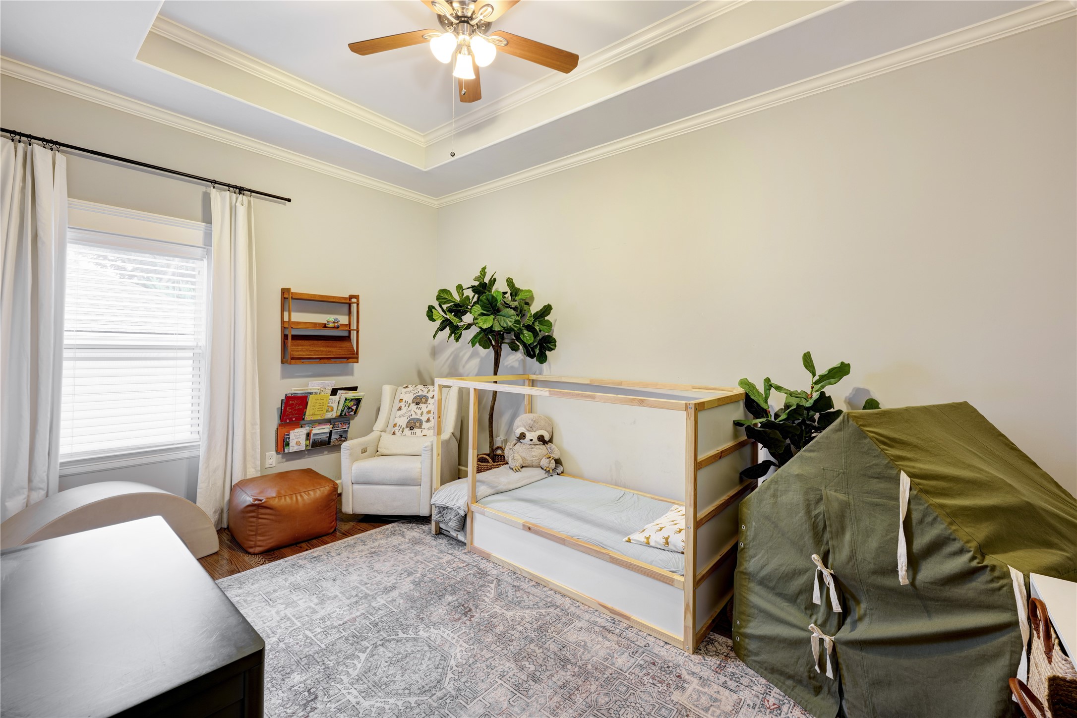 1010 Nicholson Street Houston, TX 77008 - Photo 23 of 28 a bedroom with furniture and a window