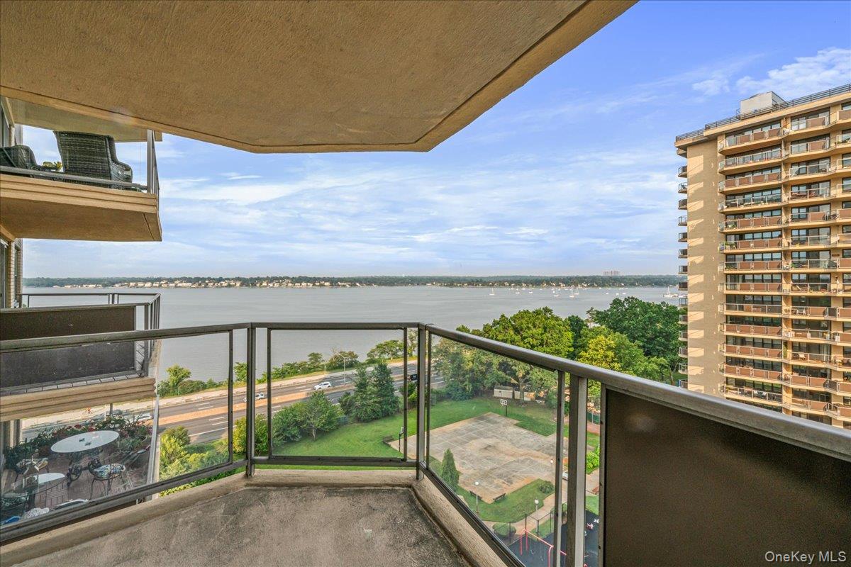 17-85 215th Street, Unit 9L Queens, NY 11360 - Photo 1 of 35 a view of balcony with floor to ceiling window and outdoor view