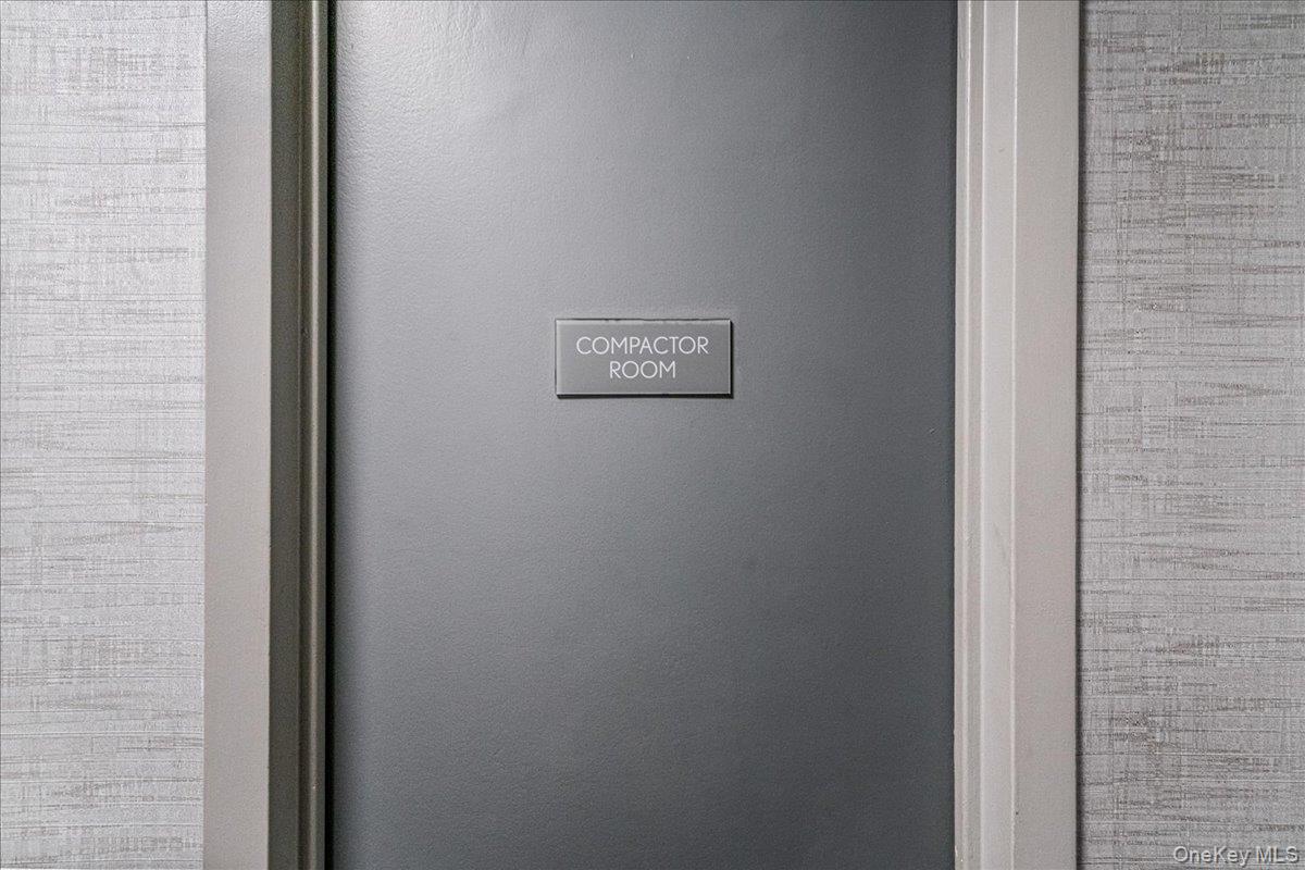 17-85 215th Street, Unit 9L Queens, NY 11360 - Photo 16 of 35 a view of a hallway