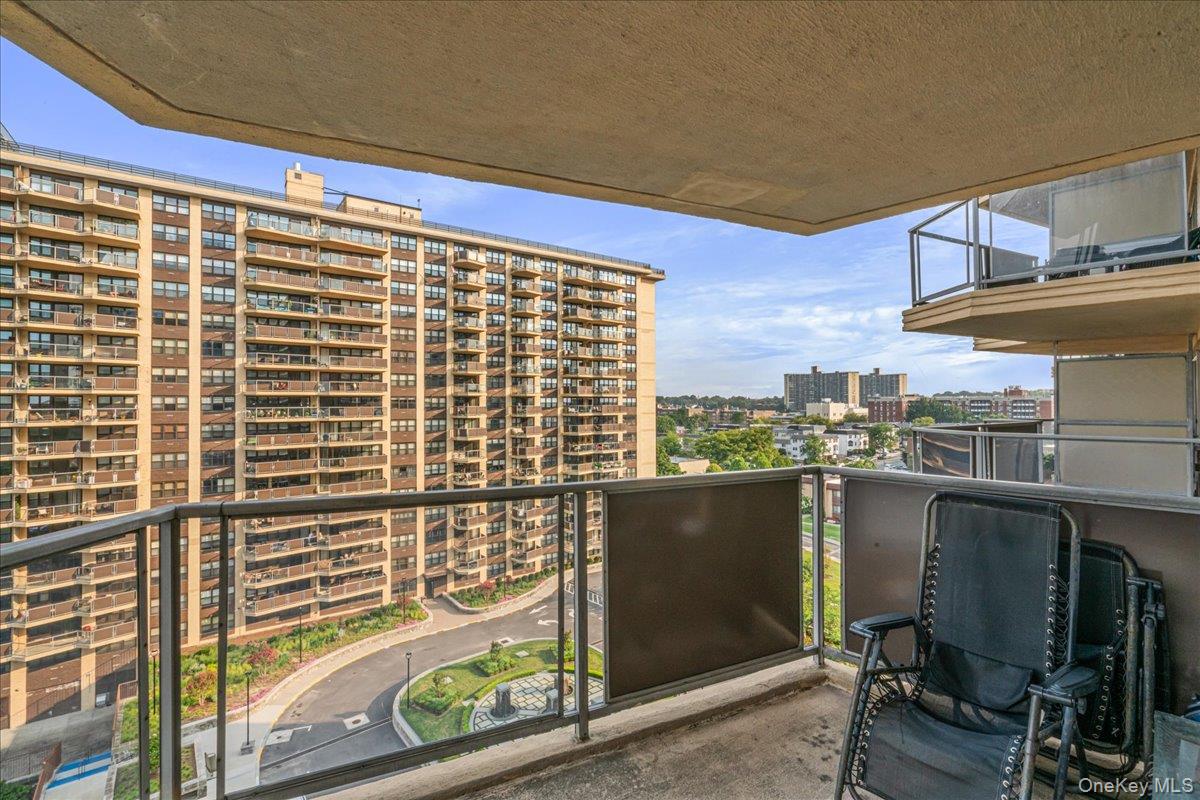 17-85 215th Street, Unit 9L Queens, NY 11360 - Photo 2 of 35 a view of a balcony with chairs