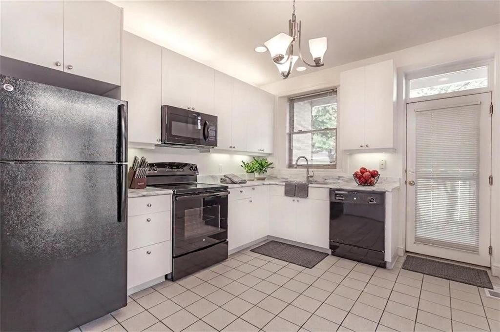 326 Hailman Street Pittsburgh, PA 15206 - Photo 6 of 22 a kitchen with stainless steel appliances granite countertop a refrigerator sink and stove