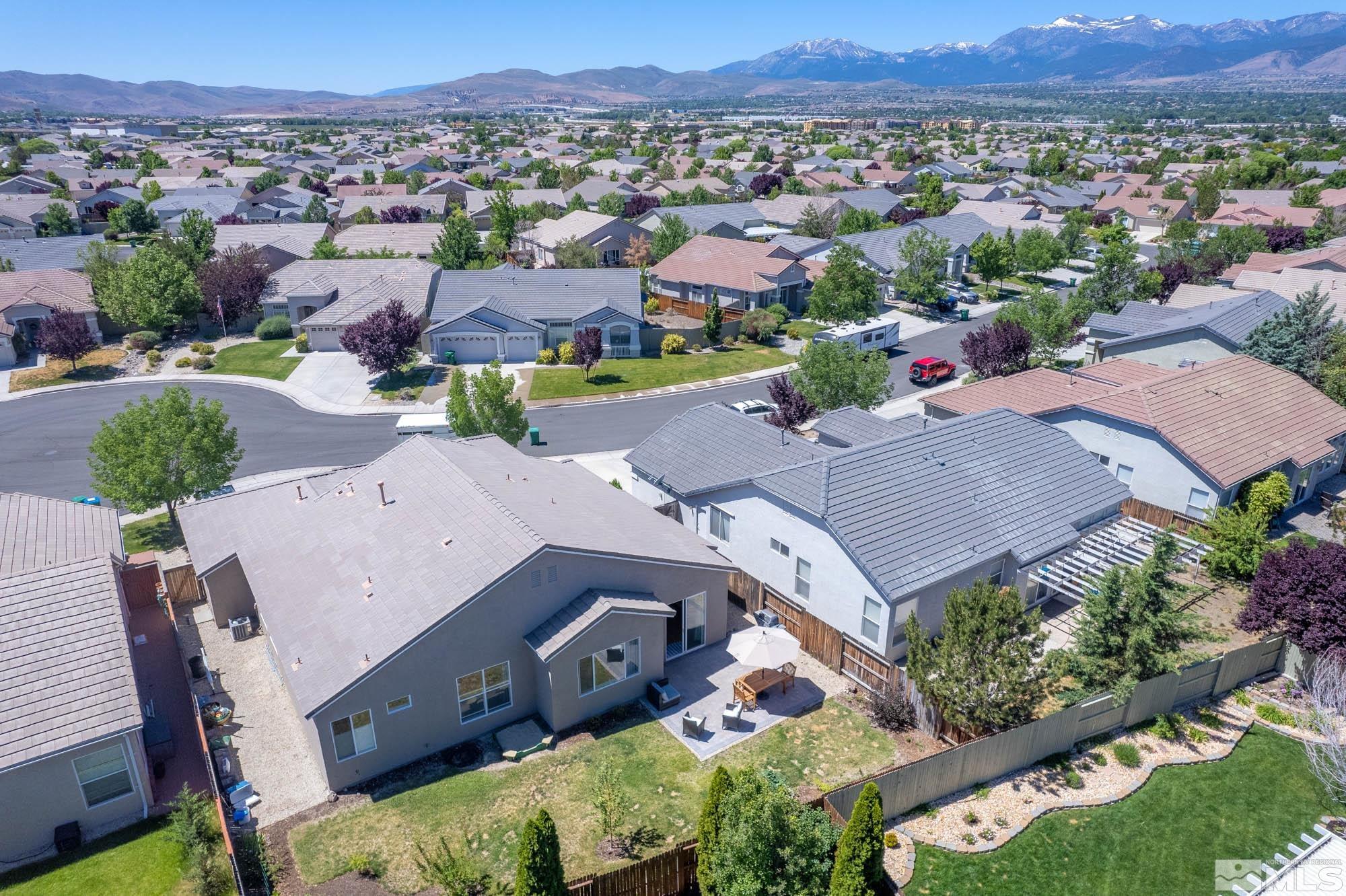 1865 Montelena Court Reno, NV 89521 - Photo 7 of 34 an aerial view of a house with a mountain