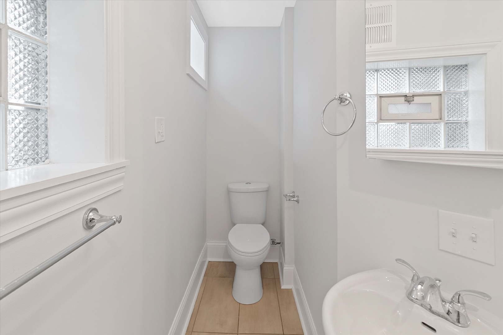 1729 South Halsted Street, Unit 2 Chicago, IL 60608 - Photo 13 of 14 a bathroom with a toilet and a sink
