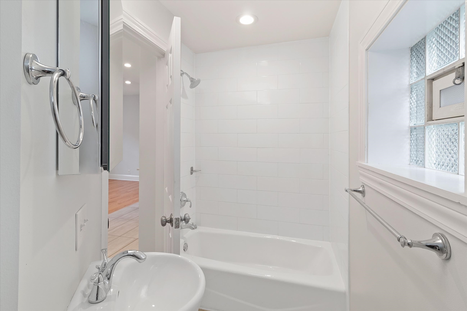 1729 South Halsted Street, Unit 2 Chicago, IL 60608 - Photo 14 of 14 a bathroom with a sink toilet and shower