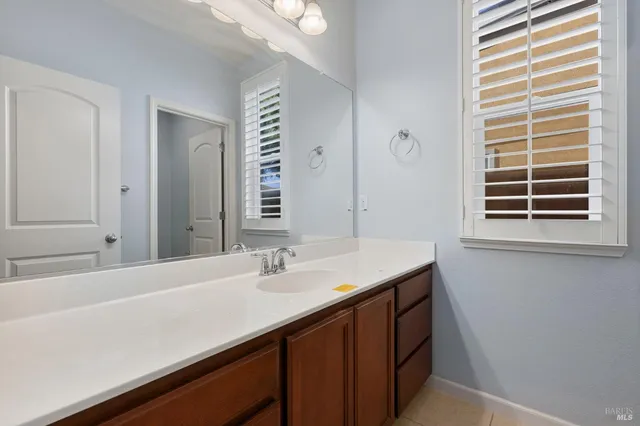 a bathroom with a toilet and a bathtub