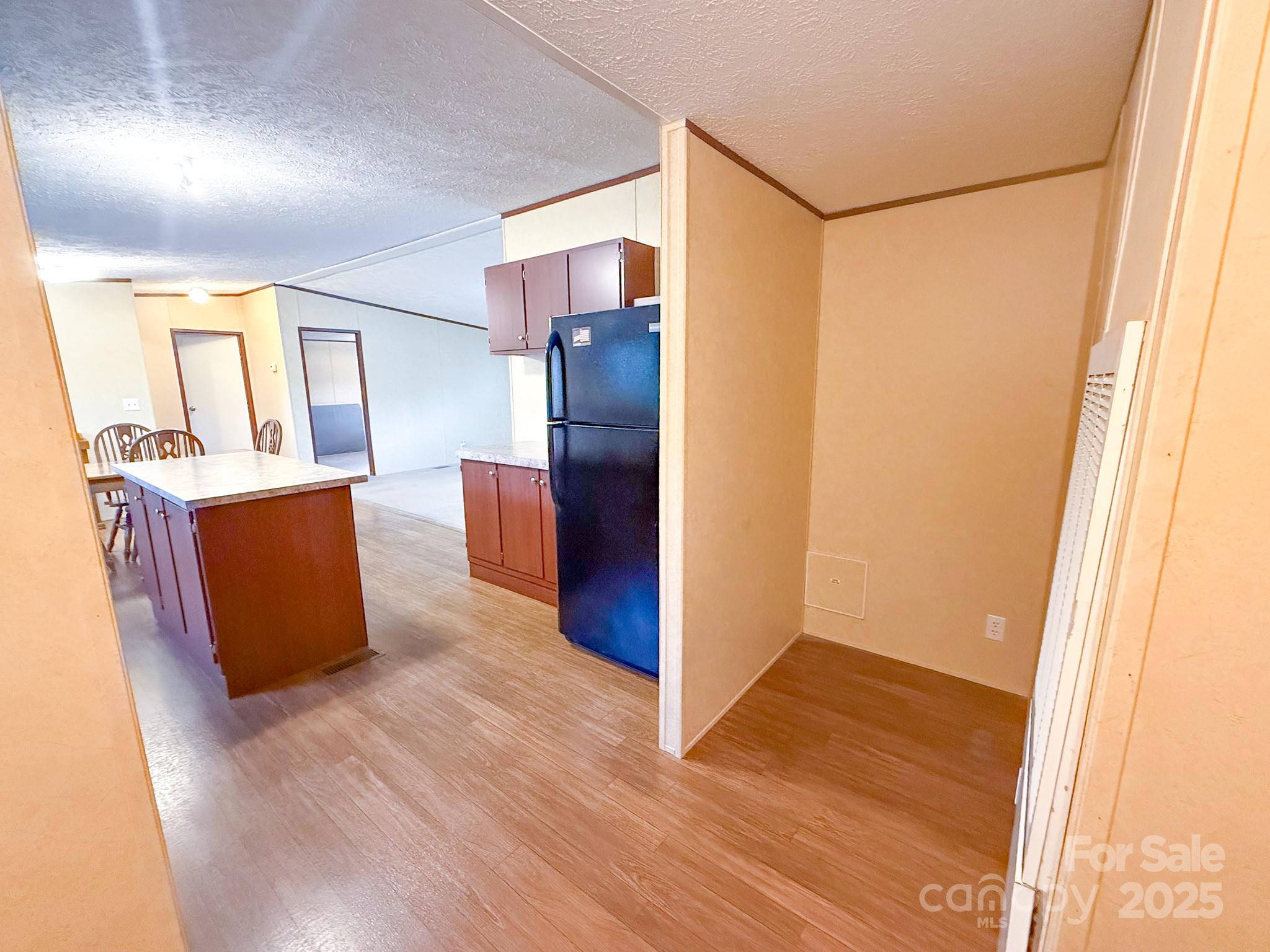 4559 Union Highway Gaffney, SC 29340 - Photo 11 of 23 an empty room with wooden floor and a window