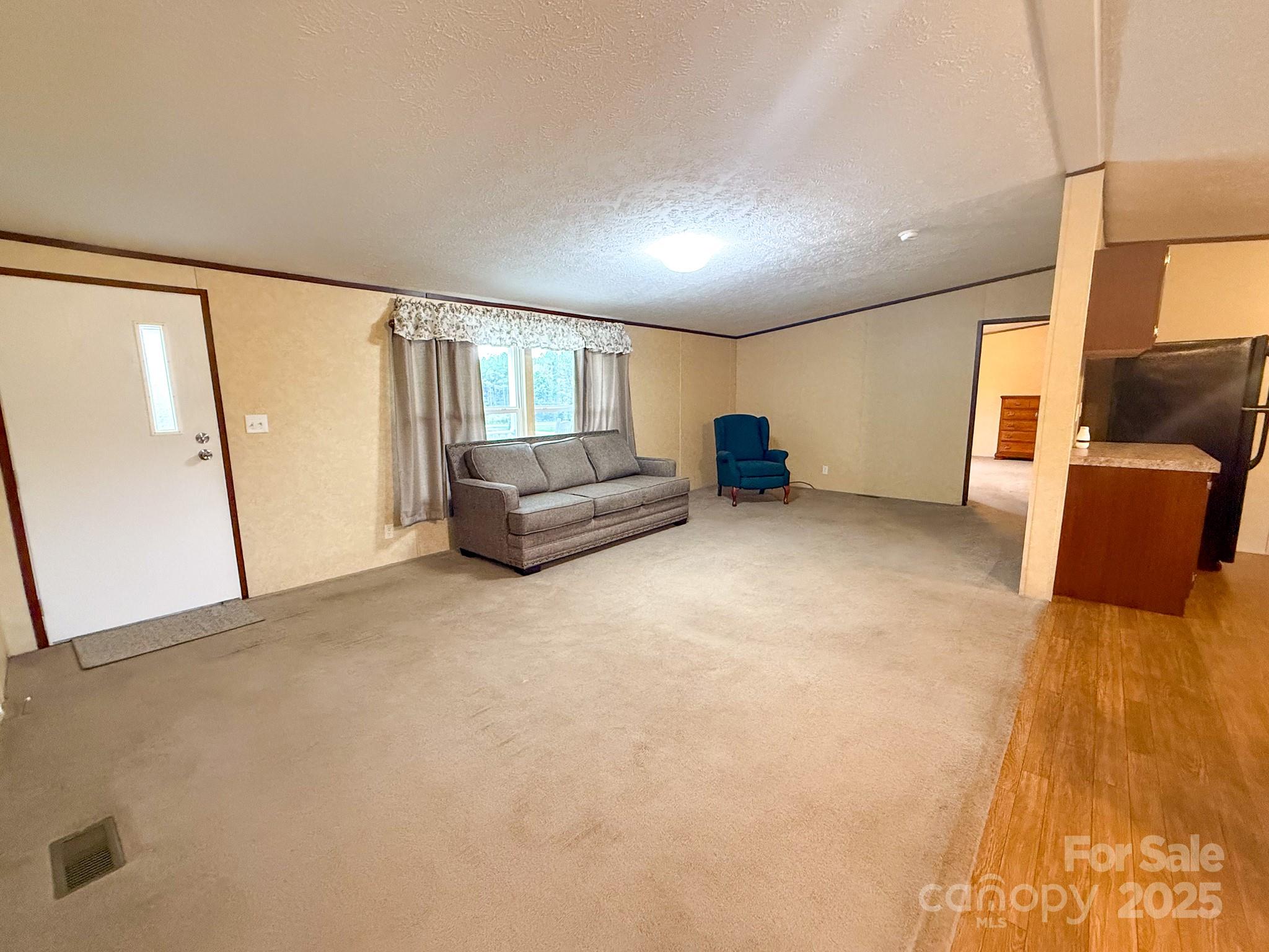 4559 Union Highway Gaffney, SC 29340 - Photo 6 of 23 a furnished livingroom with a couch