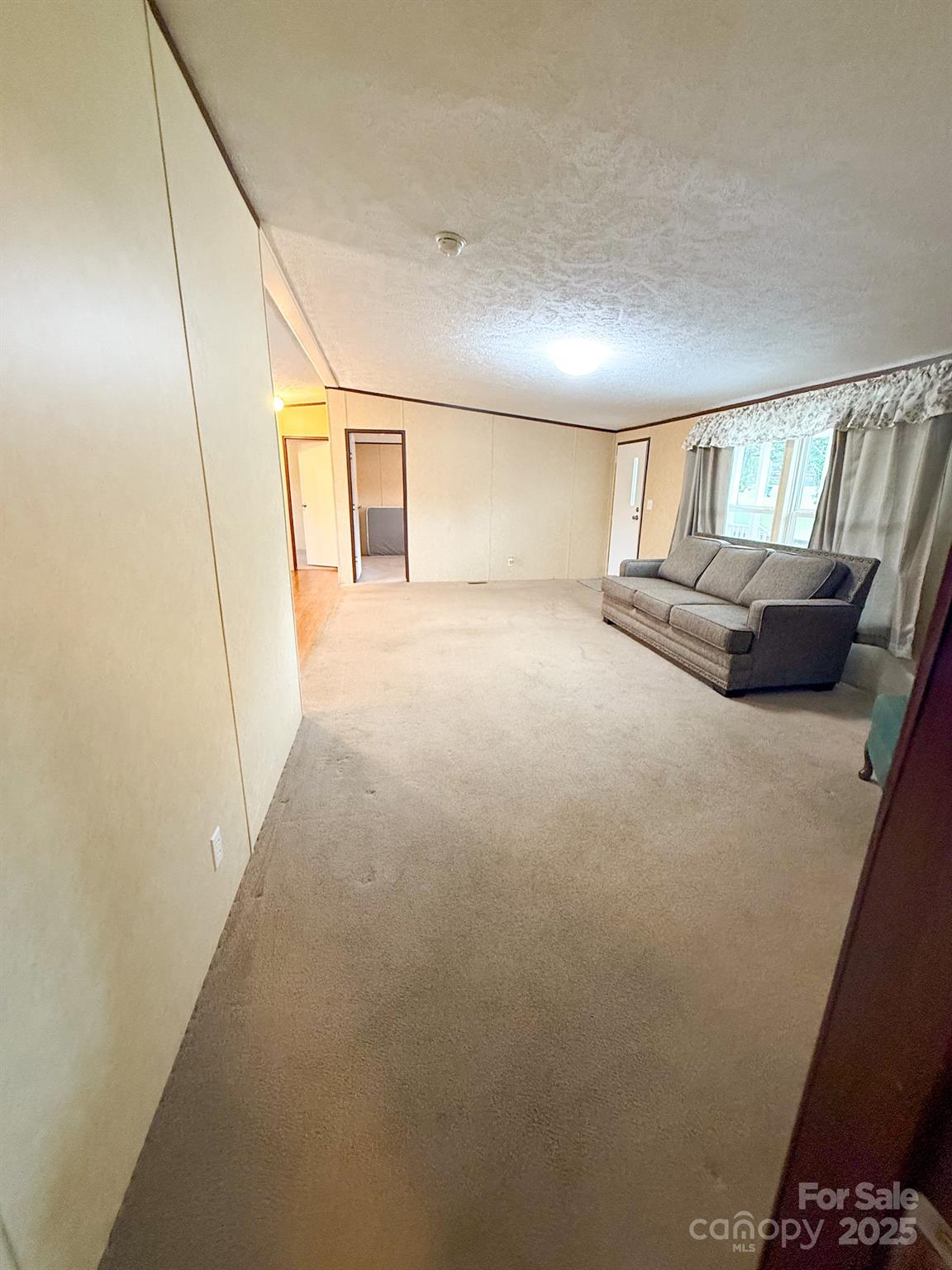 4559 Union Highway Gaffney, SC 29340 - Photo 7 of 23 a living room with furniture and a window