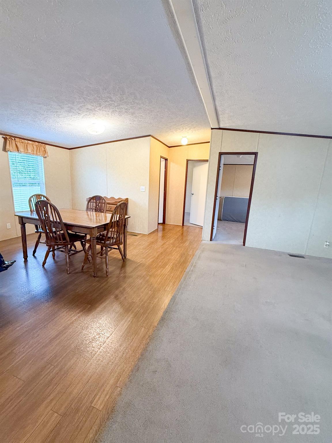 4559 Union Highway Gaffney, SC 29340 - Photo 8 of 23 a view of a livingroom with furniture and wooden floor