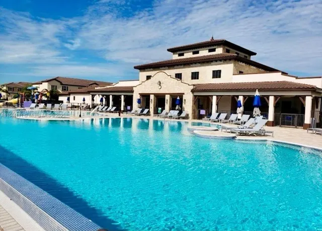 swimming pool with outdoor seating