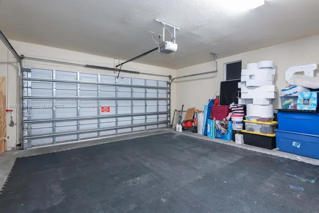a view of a garage with storage
