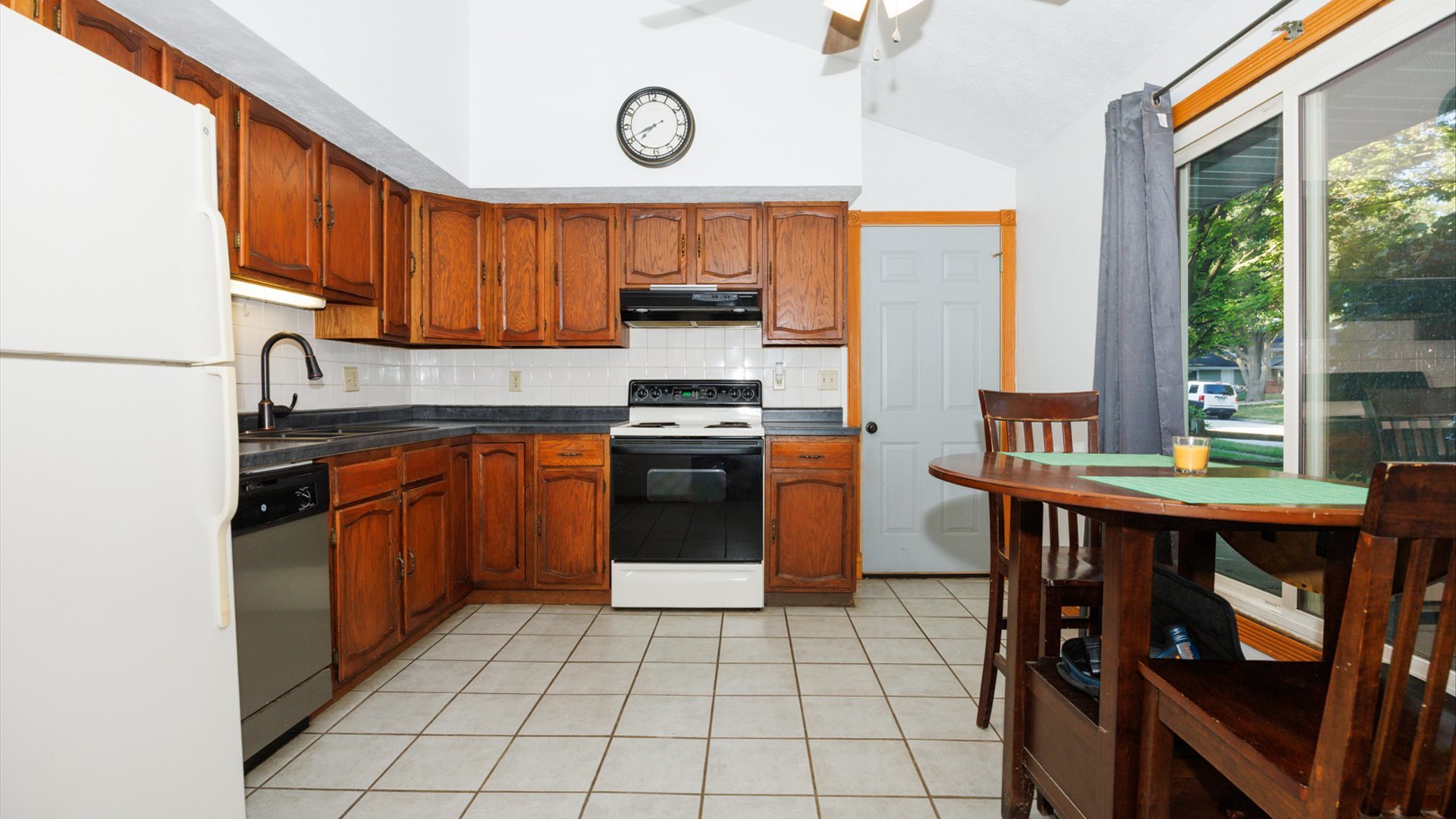 306 Judith Drive Normal, IL 61761 - Photo 11 of 40 a kitchen with stainless steel appliances granite countertop a stove a sink dishwasher and a refrigerator