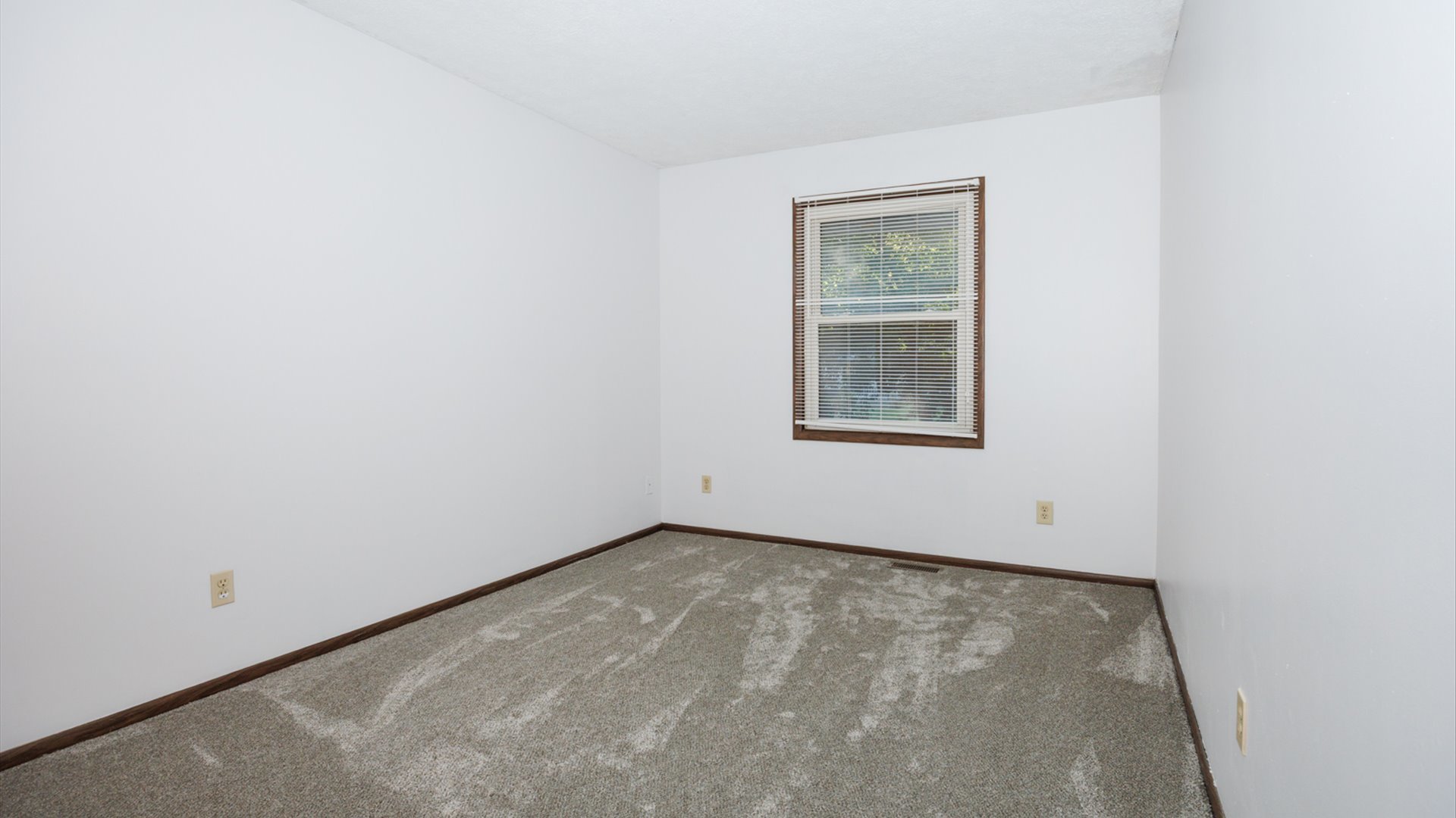 306 Judith Drive Normal, IL 61761 - Photo 16 of 40 an empty room with a window